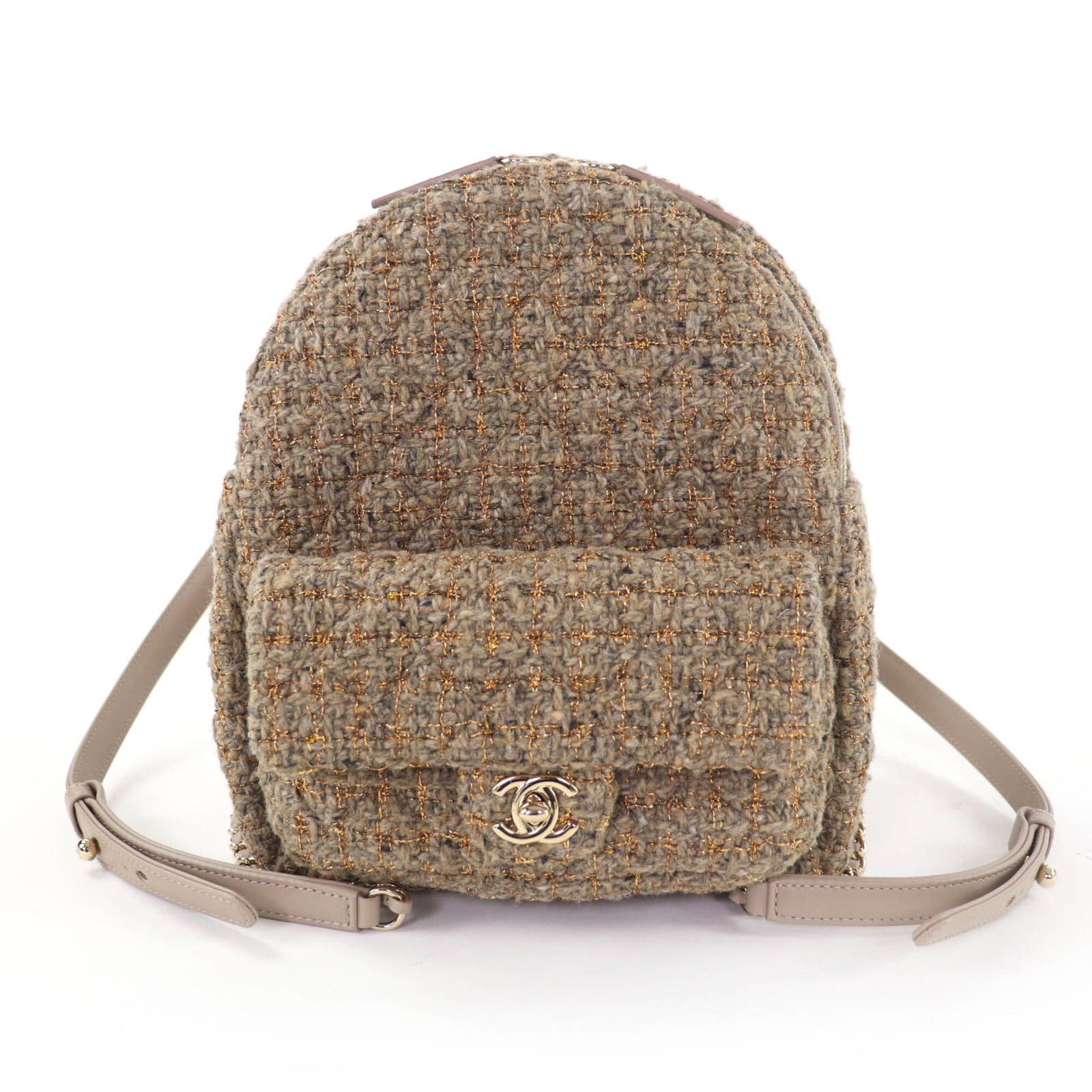 Backpack by Chanel: Backpack by Chanel Brown leather backpack with classic Chanel design, measuring 22cm x 18cm x 9cm. This stylish backpack is made from high-quality materials and features a timeless brown color. A