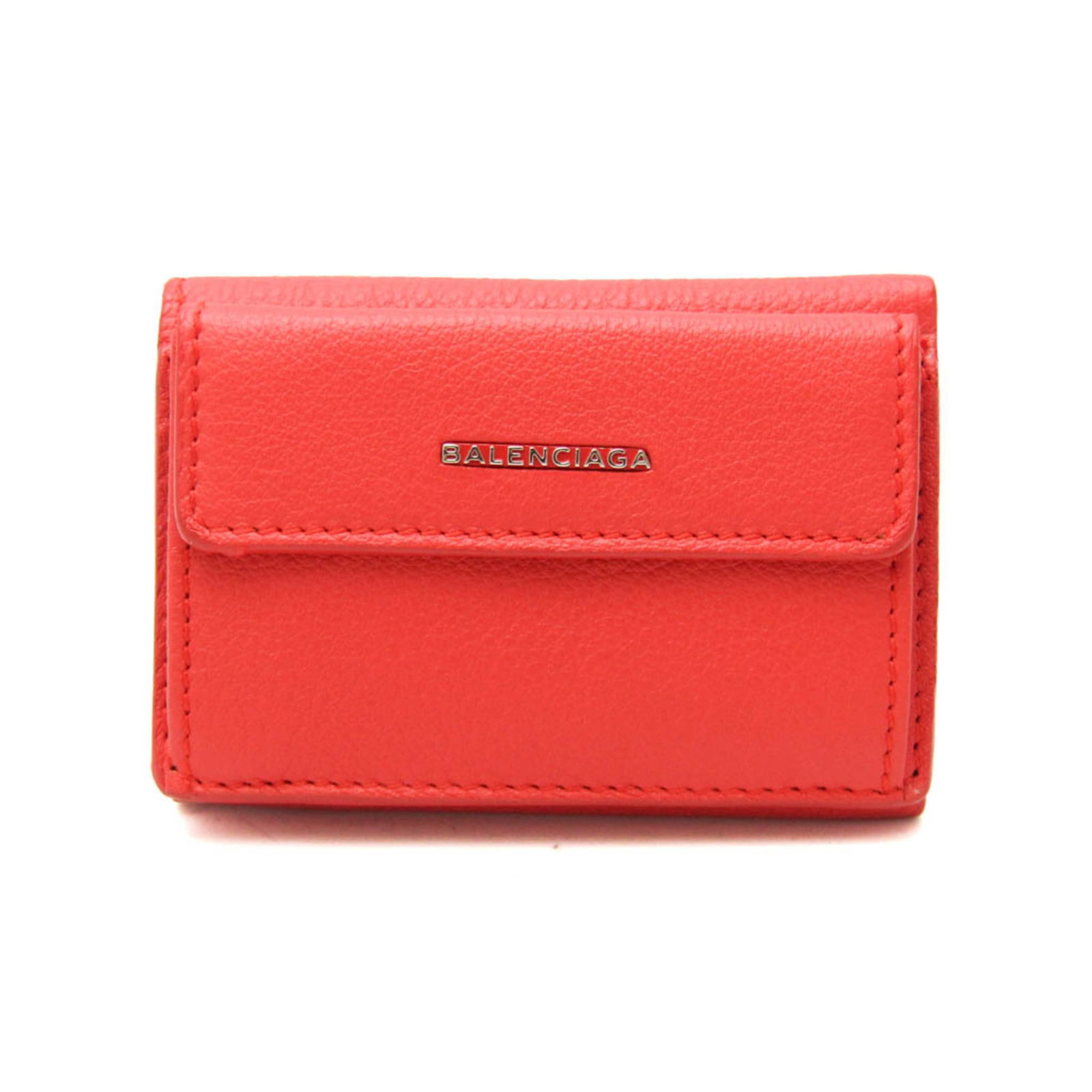 Balenciaga Wallet (Tri-Fold) Leather: Balenciaga Wallet (Tri-Fold) Leather The Balenciaga Essential Mini Wallet 410133 is a stylish tri-fold leather wallet with a vibrant orange color, featuring a snap closure and a convenient inner