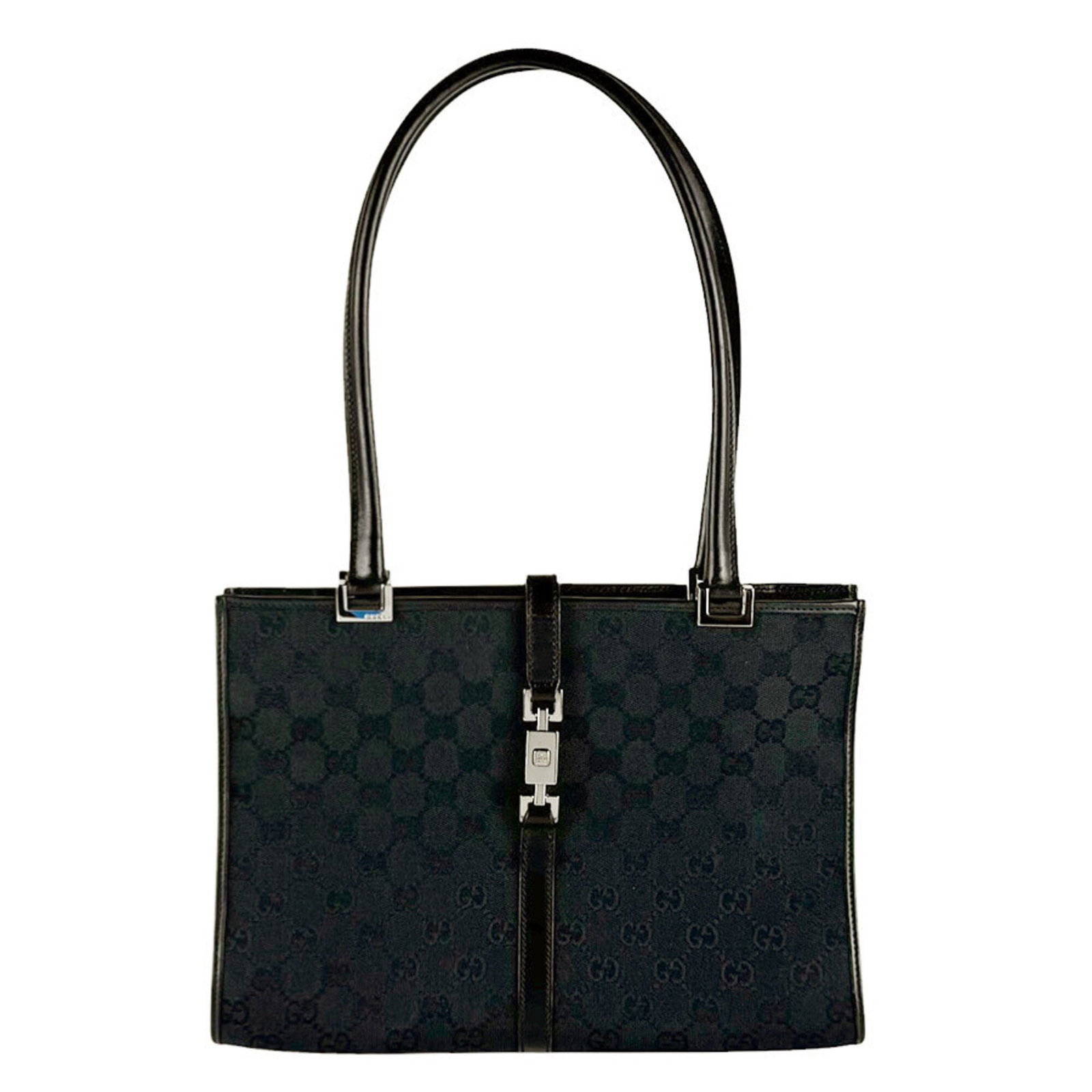 Canvas Leather Handbag Gucci: Canvas Leather Handbag Gucci GG canvas and leather come together in this sleek black Gucci handbag, measuring 20cm x 30cm x 8cm. The iconic GG pattern adds a touch of luxury to this stylish accessory,