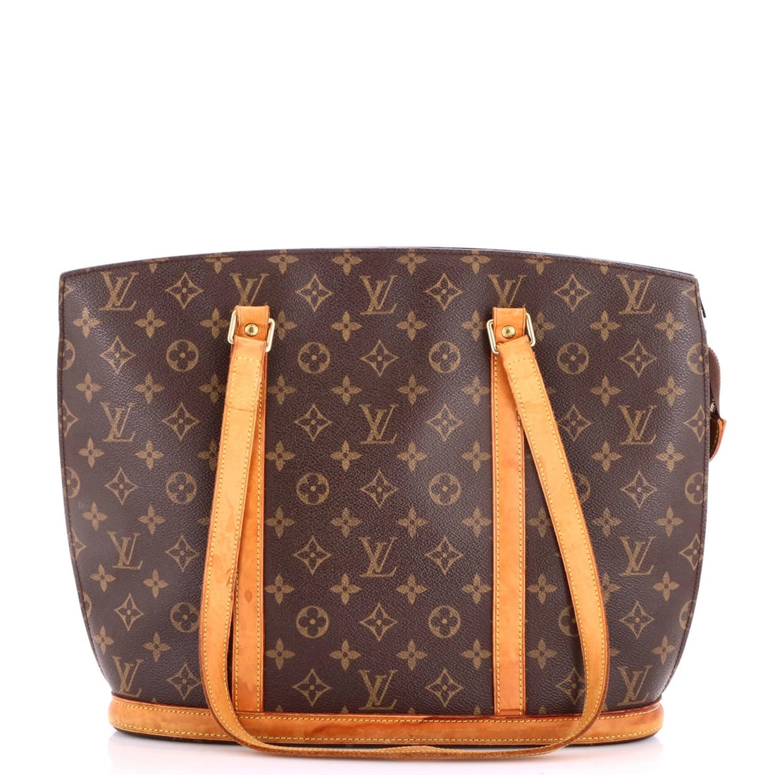 Handbag Louis Vuitton Monogram Babylone Canvas: Handbag Louis Vuitton Monogram Babylone Canvas This Louis Vuitton Babylone Monogram canvas handbag features a classic totes design with a brown exterior and neutral interior. The bag's exterior shows 
