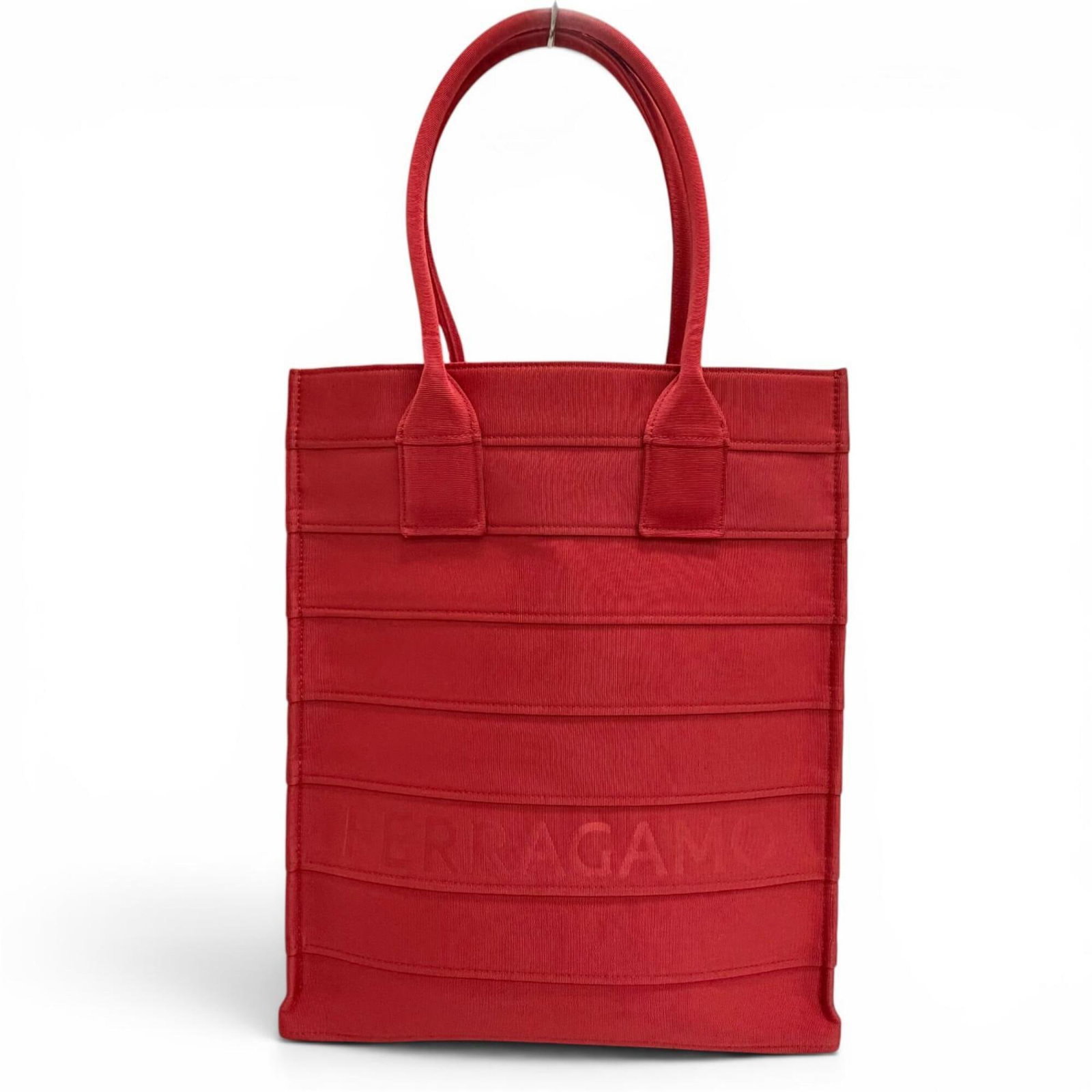 Bag Leather Salvatore Ferragamo Tote: Bag Leather Salvatore Ferragamo Tote Red leather Salvatore Ferragamo tote bag, made from high-quality leather with a size of 39cm x 33.7cm x 13cm. The iconic Italian brand's signature style is evident