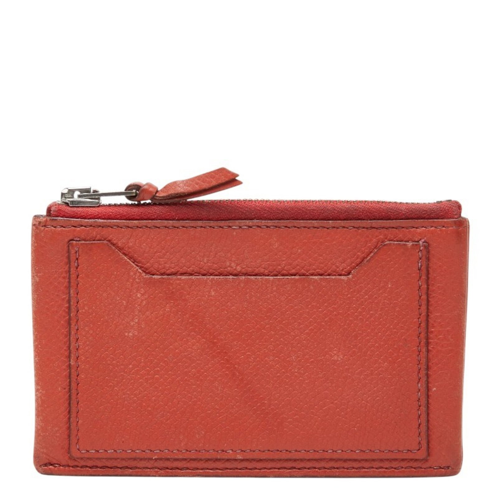 Hermes Coin Purse/ Coin Case Leather: Hermes Coin Purse/ Coin Case Leather This vibrant orange leather coin purse from Hermes features a compact size and sleek design, making it a stylish accessory for everyday use. Measuring 7cm x