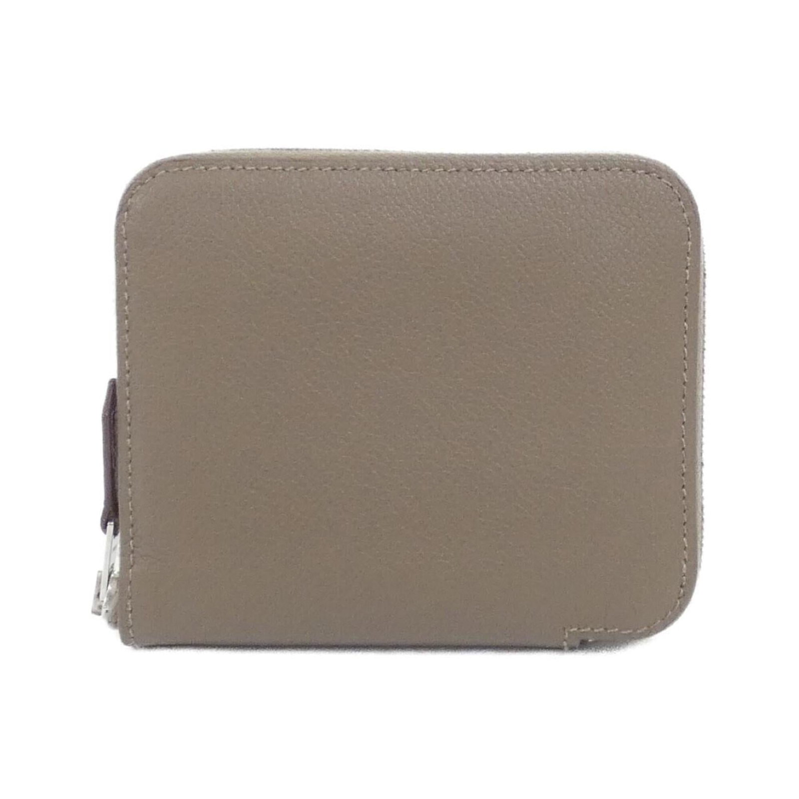 Coin Purse Coin Case: Coin Purse Coin Case The Hermes Silk'in Coin Purse Coin Case boasts a sleek, compact design with a soft blue hue and taupe accents, measuring 9cm x 11cm x 1.5cm. Its slim profile and sturdy constructi