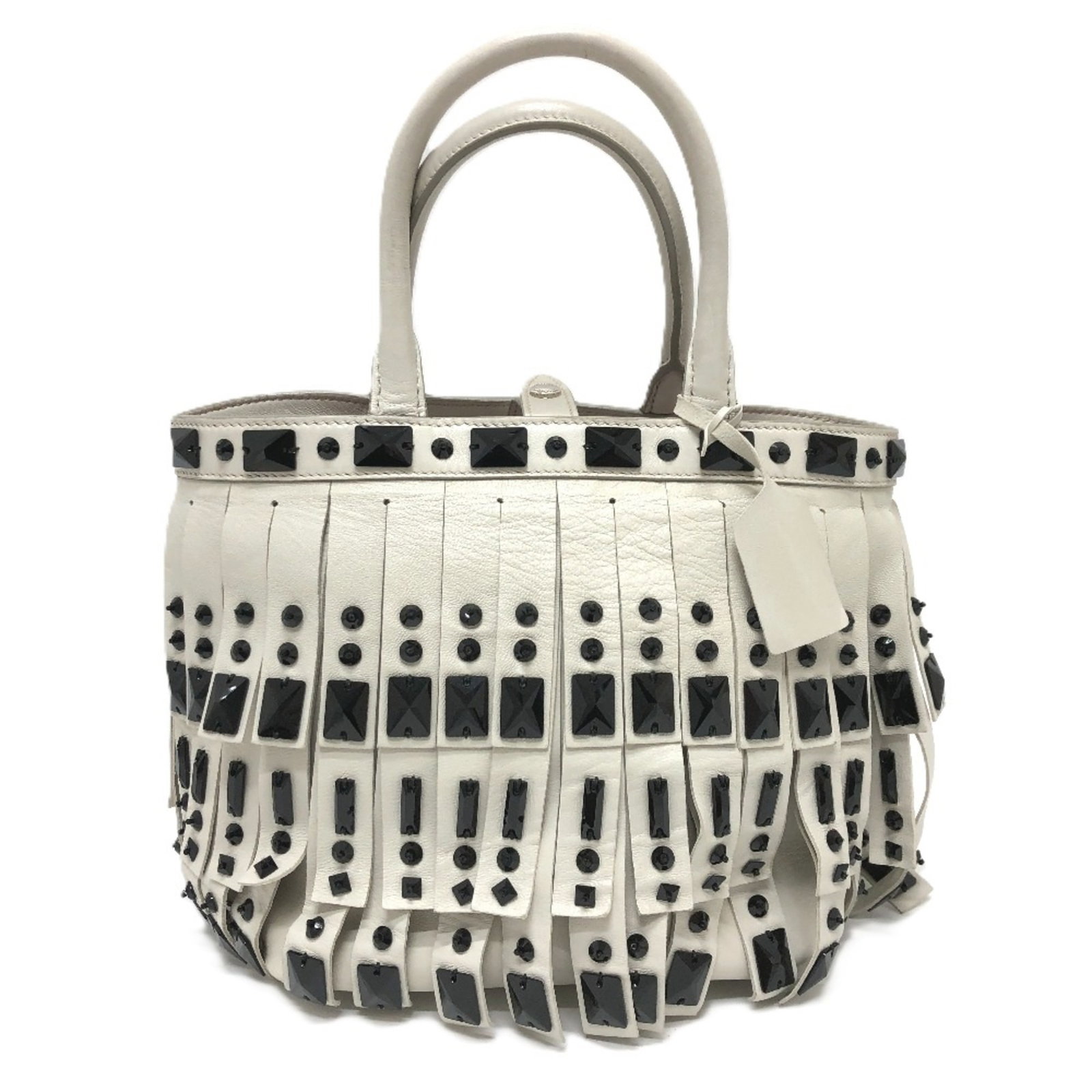 Handbag Leather Prada: Handbag Leather Prada White leather Prada handbag with a classic design, measuring 18.5cm x 28cm x 12.5cm, comes with a dust bag and guarantee card. This stylish accessory is made from high-quality le