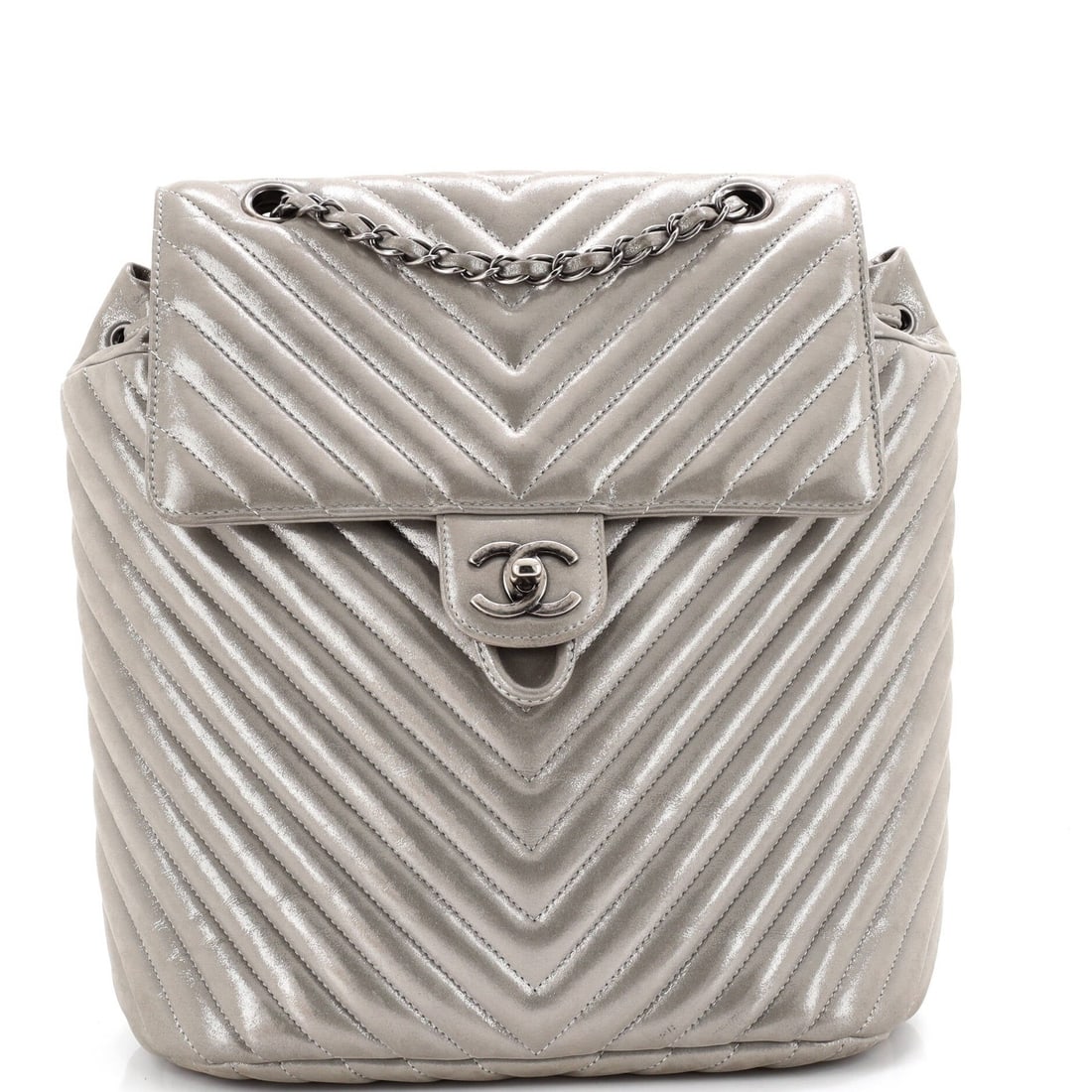 Urban Chevron Leather Backpack Large Chanel: Urban Chevron Leather Backpack Large Chanel Silver Urban Chevron Leather Backpack with a large size and spacious interior. This stylish backpack features a sleek exterior with minor scuffs, creases,