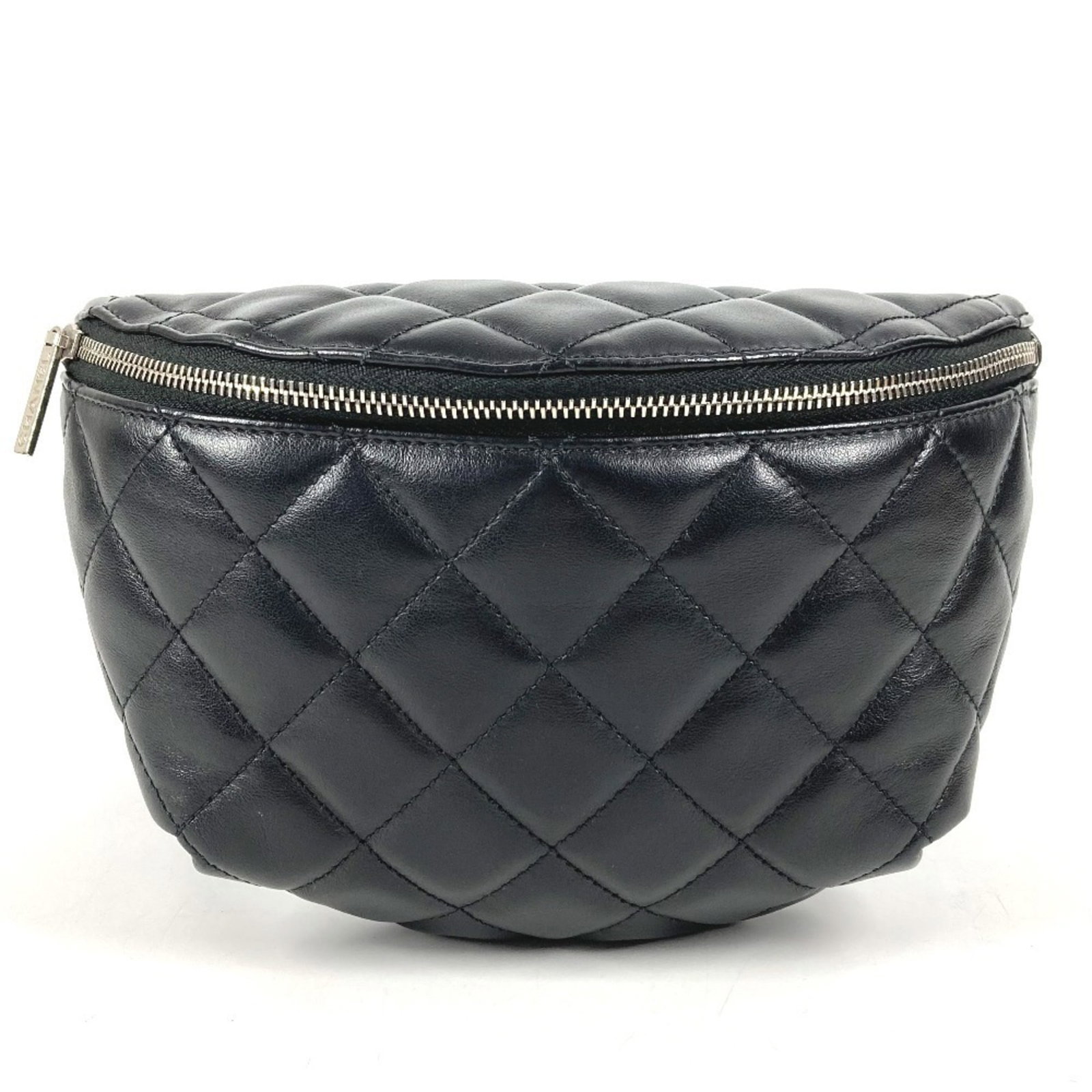 Fanny Pack Leather Shoulder Bag Chanel: Fanny Pack Leather Shoulder Bag Chanel This black leather fanny pack shoulder bag from Chanel features a classic Matelasse design, crafted from high-quality leather. Measuring 14cm x 21cm, it offers