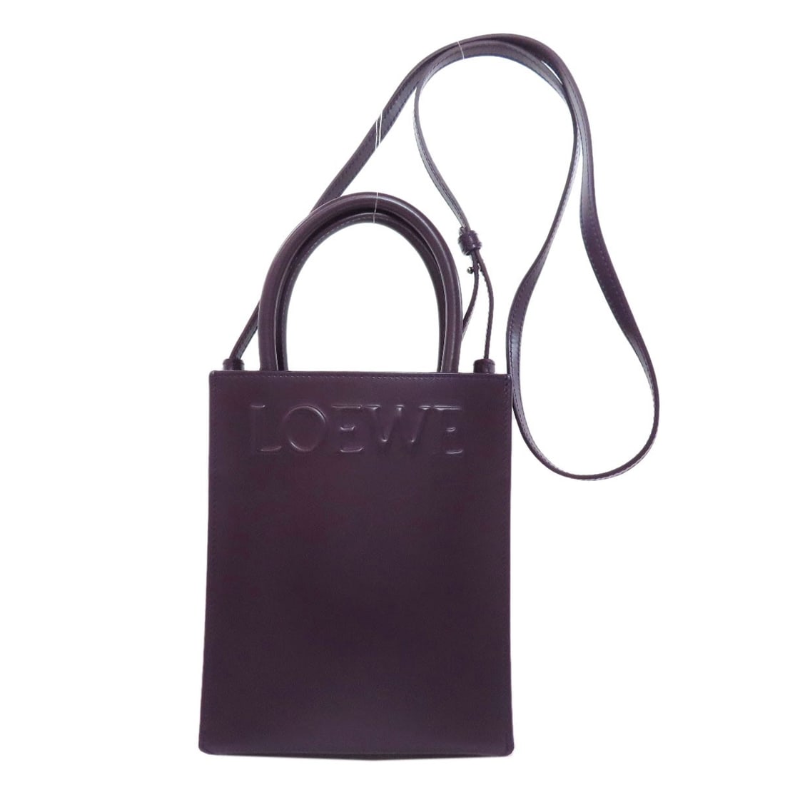 Loewe Calf Standard A5 2Way Handbag: Loewe Calf Standard A5 2Way Handbag Purple Loewe Calf Standard A5 2Way Handbag. This handbag features a signature and is made from calf material. The exterior is purple in color. Item Specifics: