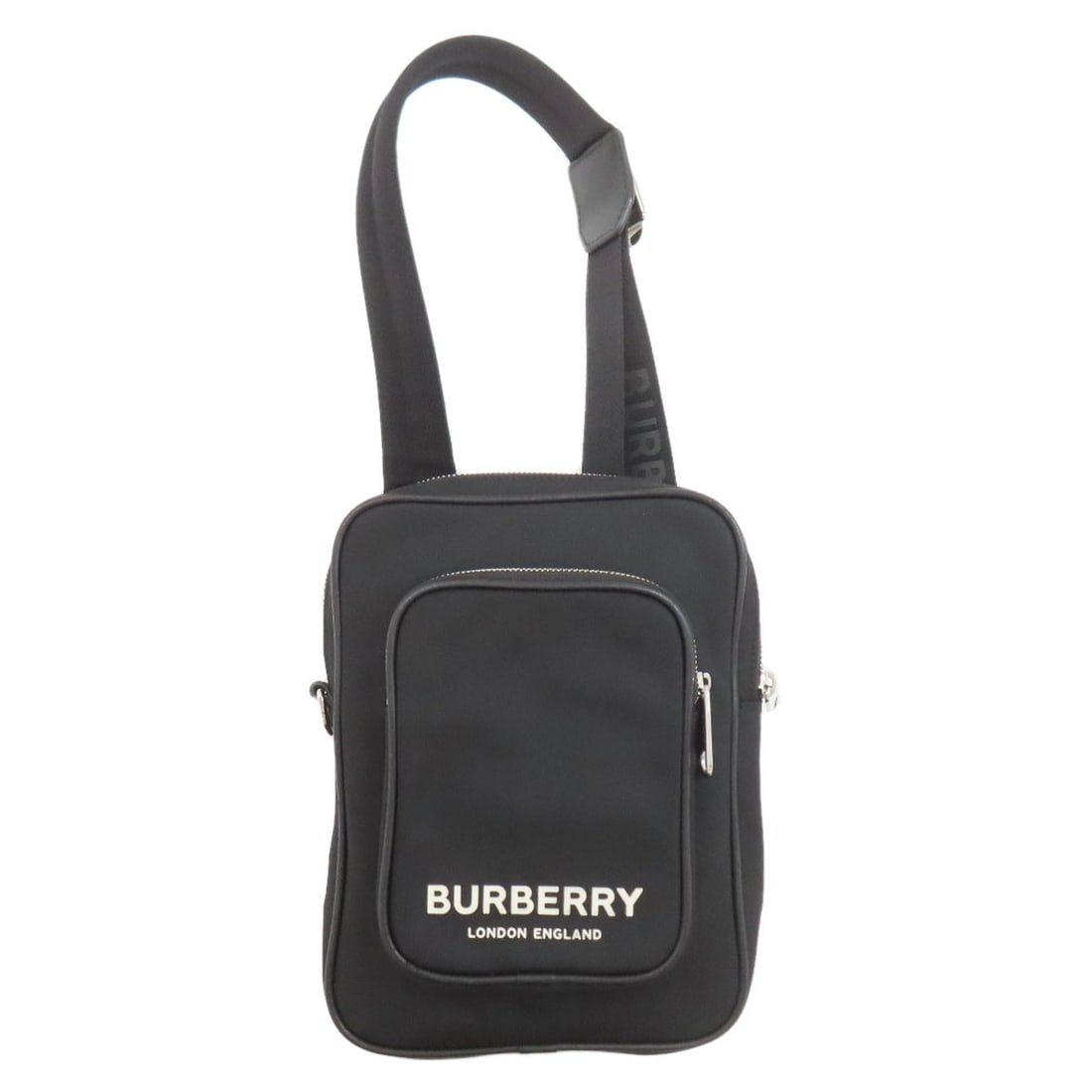 Body Bag Nylon Burberry: Body Bag Nylon Burberry Black nylon body bag from BURBERRY. Made from durable nylon, this body bag features a sleek black exterior. The simple, modern design makes it a versatile accessory. Item