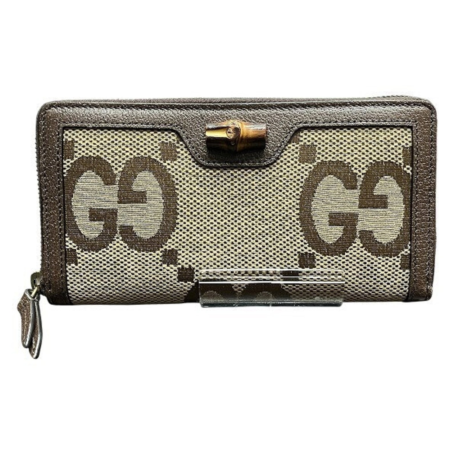 Bamboo Gg Canvas Bi fold Long Wallet Gucci: Bamboo Gg Canvas Bi fold Long Wallet Gucci Bamboo and GG canvas come together in this unique bi-fold long wallet from Gucci, offering a stylish and eco-friendly alternative to traditional leather wall