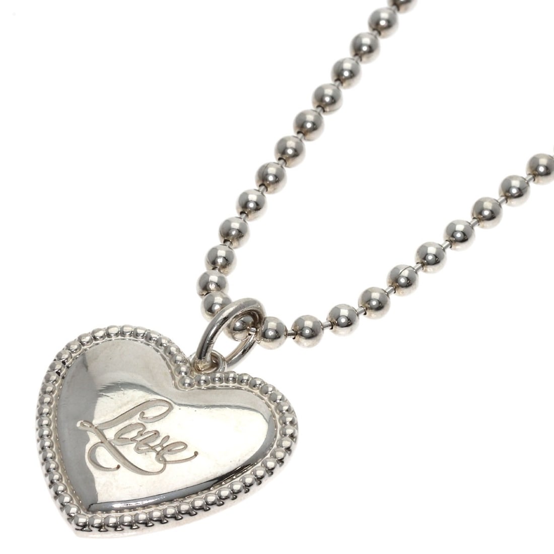 Silver Heart Necklace Love Tiffany: Silver Heart Necklace Love Tiffany Silver Heart Necklace Love Tiffany is a 15.7-inch long necklace made of silver metal with a silver exterior color. The necklace features no main stone, making it a