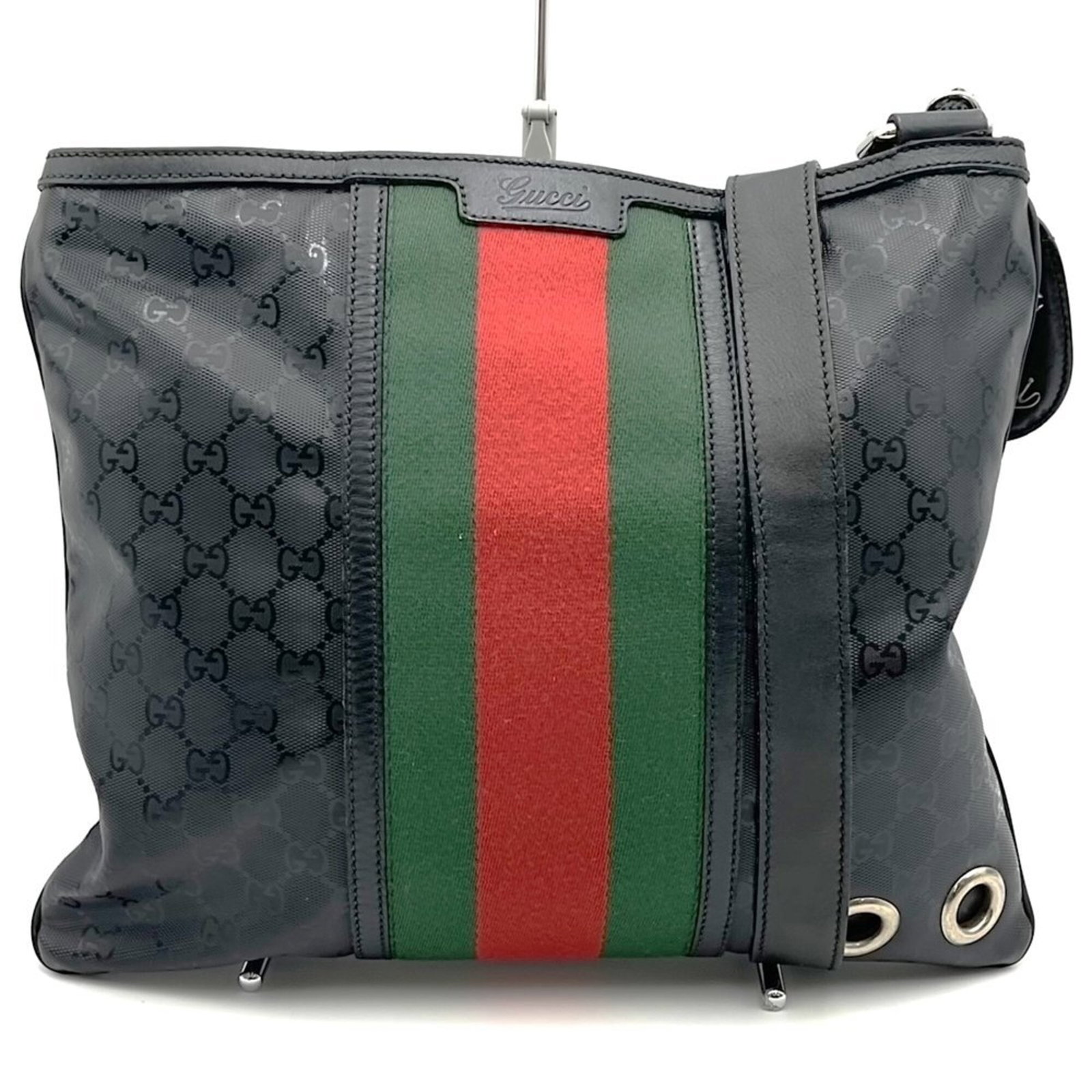Canvas Leather Bag Shoulder Gucci: Canvas Leather Bag Shoulder Gucci Canvas Leather Bag Shoulder Gucci bears a signature and is made from a combination of canvas and leather materials. The bag measures 29cm x 34cm x 3cm and features a