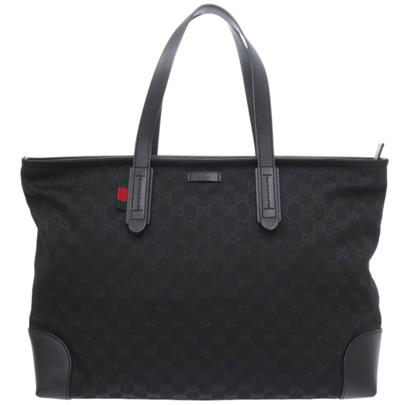 Canvas Gg Bag Tote Gucci: Canvas Gg Bag Tote Gucci Gucci's iconic GG canvas tote bag is a timeless piece of fashion, boasting the signature interlocking GG logo in black. Made from high-quality canvas material, this stylish