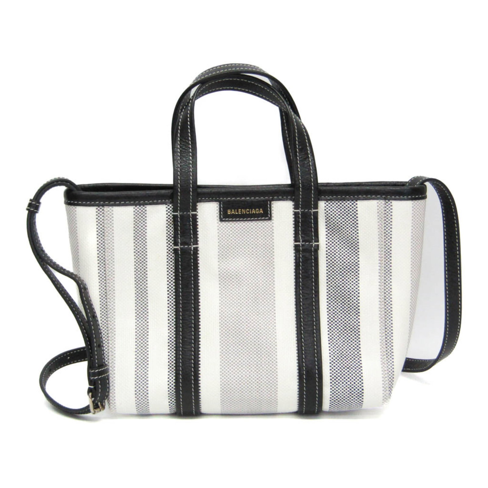 Handbag Leather Bag Polyamide Shoulder Balenciaga: Handbag Leather Bag Polyamide Shoulder Balenciaga The Balenciaga BARBES SMALL shoulder bag features a sleek design with a top width of 31cm and a magnetic snap closure. Its durable leather and