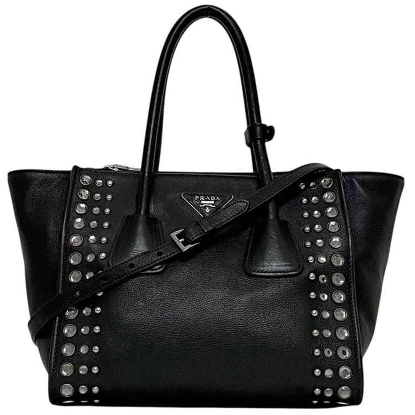 Prada Handbag Shoulder Bag Leather: Prada Handbag Shoulder Bag Leather Prada Handbag Shoulder Bag Leather is a sleek and sophisticated black leather shoulder bag. Measuring 21cm x 34cm x 19cm, it features a sturdy strap length of 124cm 