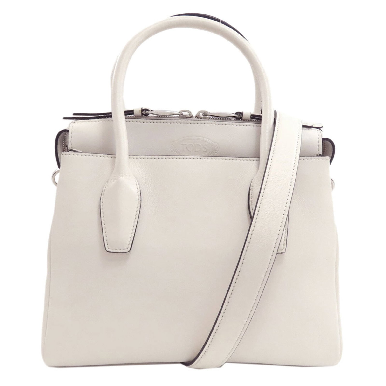 Handbag Leather Tod'S: Handbag Leather Tod'S White leather Tod's handbag with dimensions 18.5cm x 25.5cm x 11.5cm. This Tod's handbag features high-quality leather construction and a classic design. Item Specifics: Brand: