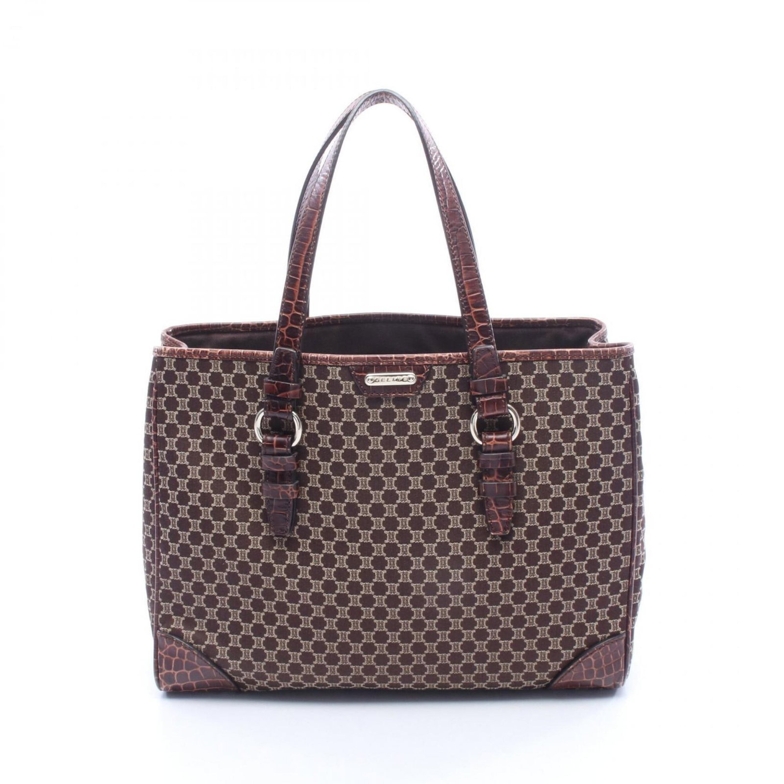 Canvas leather handbag tote Celine: Canvas leather handbag tote Celine Canvas leather handbag tote from Celine's Macadam line, featuring a sturdy canvas body and high-quality leather accents in a rich brown color. Measuring 27cm x 35cm