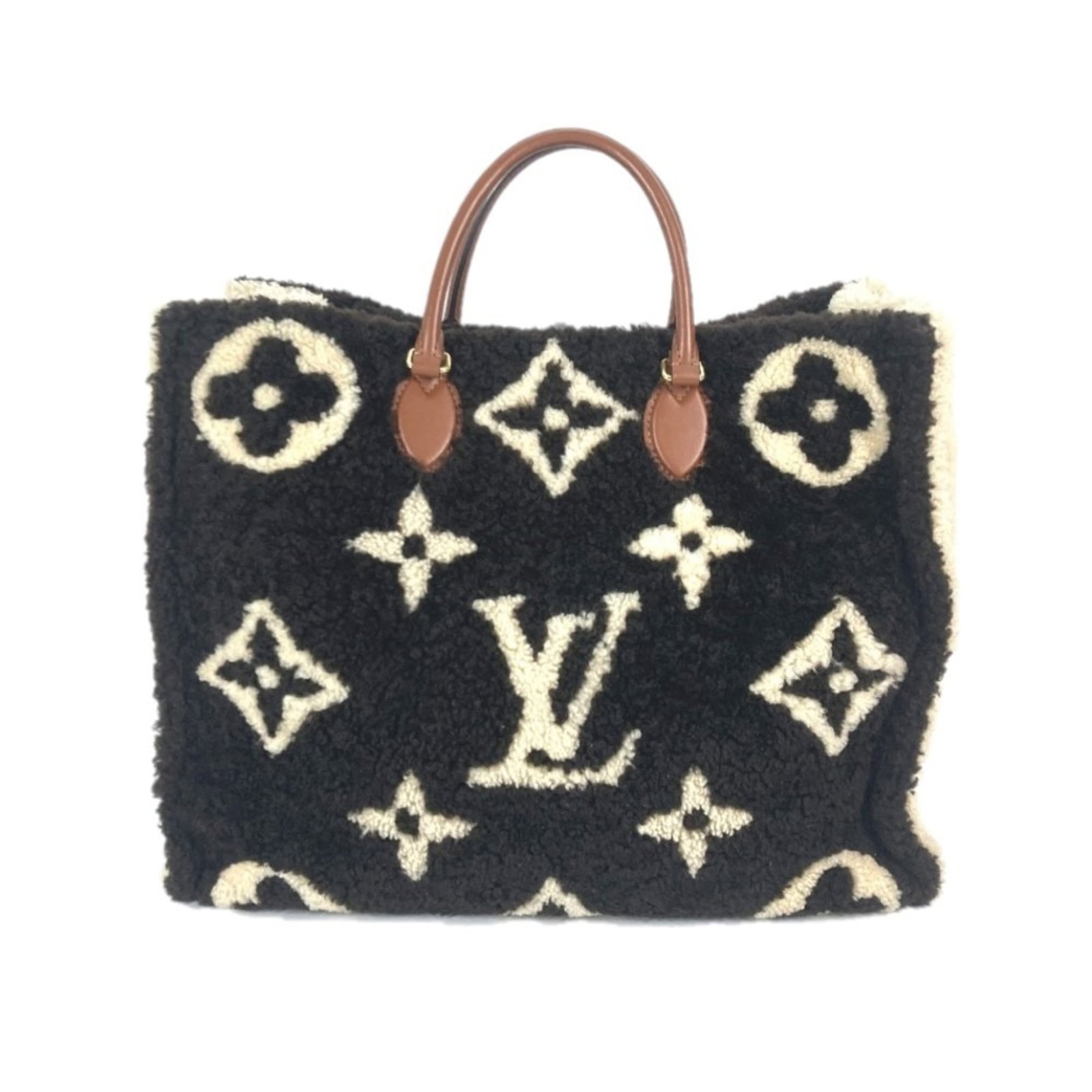 Shoulder Bag Tote Monogram Louis Vuitton: Shoulder Bag Tote Monogram Louis Vuitton Monogrammed with iconic Louis Vuitton design, this beige and brown shoulder bag tote boasts a timeless style. Featuring a spacious interior and a functional