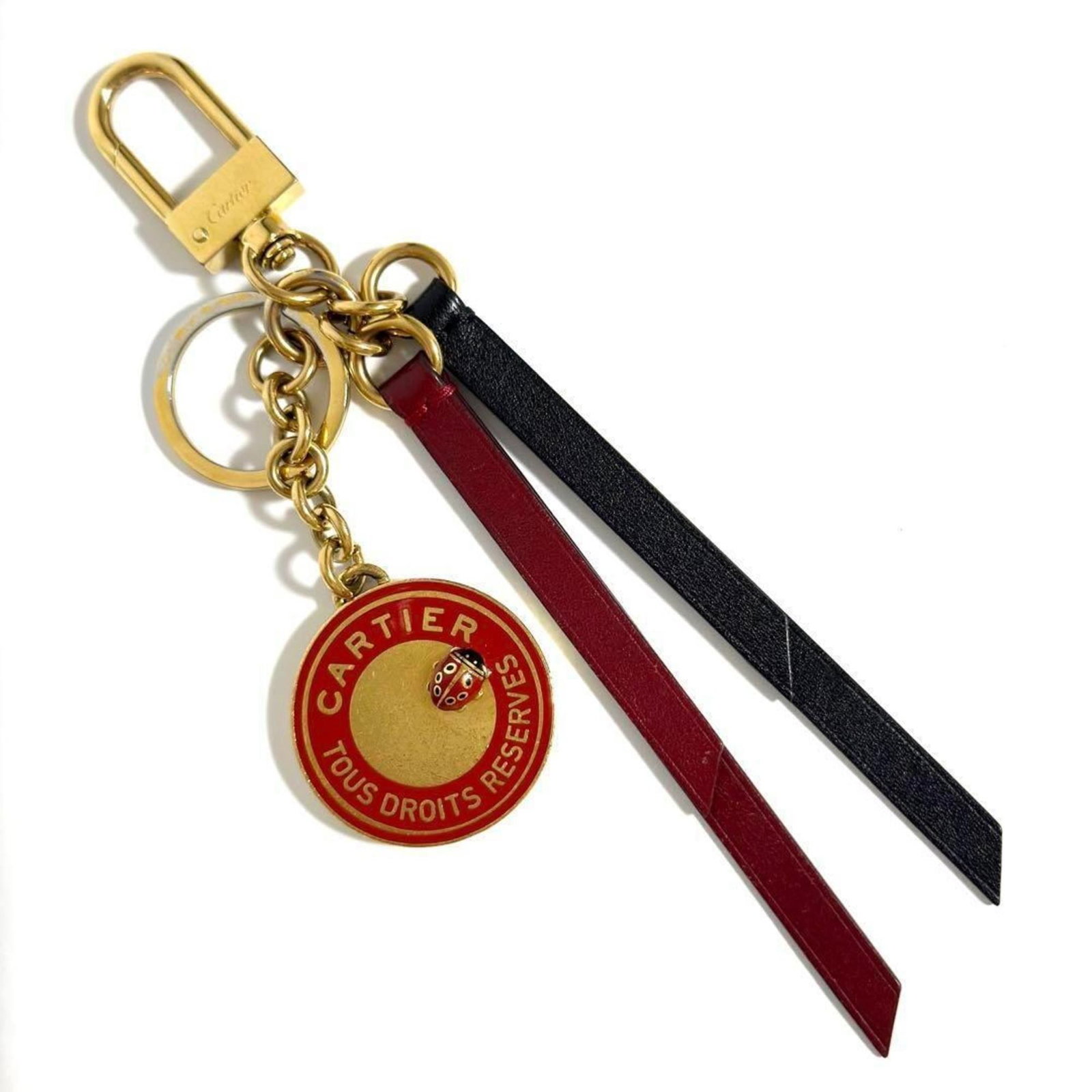 Keyring Leather Metal Cartier: Keyring Leather Metal Cartier Cartier's signature metal and leather combination makes this keyring a stylish accessory. The item comes with a box and dust bag for added protection and presentation. A 