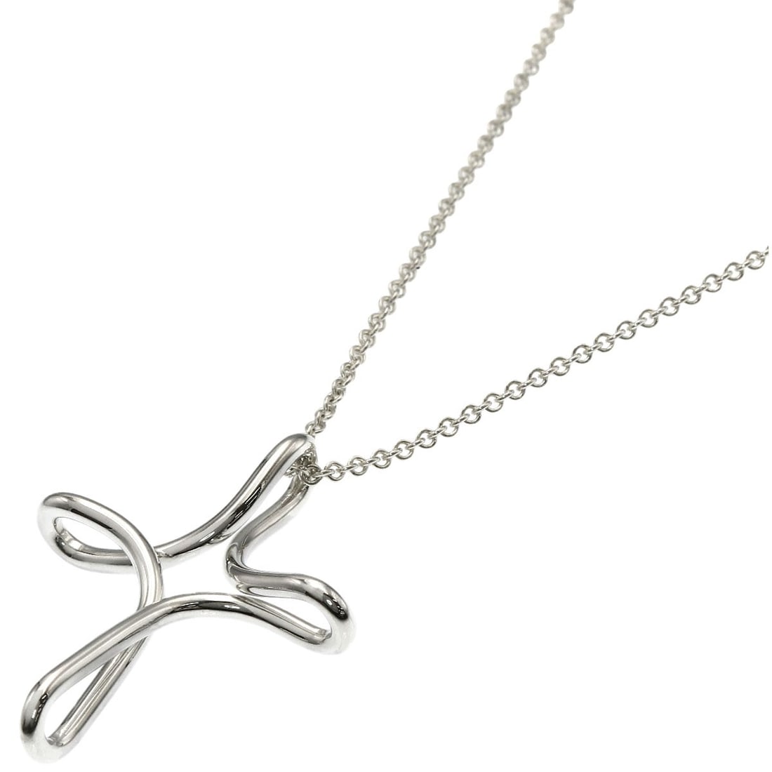 Cross Necklace Tiffany Co. Open Silver: Cross Necklace Tiffany Co. Open Silver The Tiffany & Co. Open Silver Cross Necklace is a sleek and modern design, featuring an open silver chain with a minimalist cross pendant. Made from high-quality