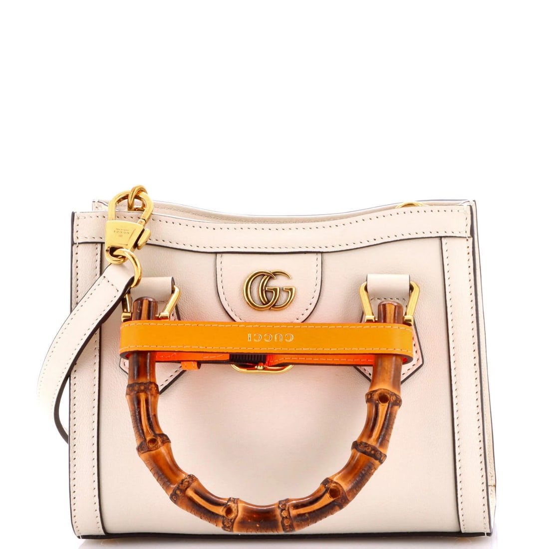 Gucci Leather Mini Bamboo Handle Tote Diana NM: Gucci Leather Mini Bamboo Handle Tote Diana NM This Gucci Leather Mini Bamboo Handle Tote features a neutral white exterior with a classic cross-body design, complete with a gold-toned bamboo handle a