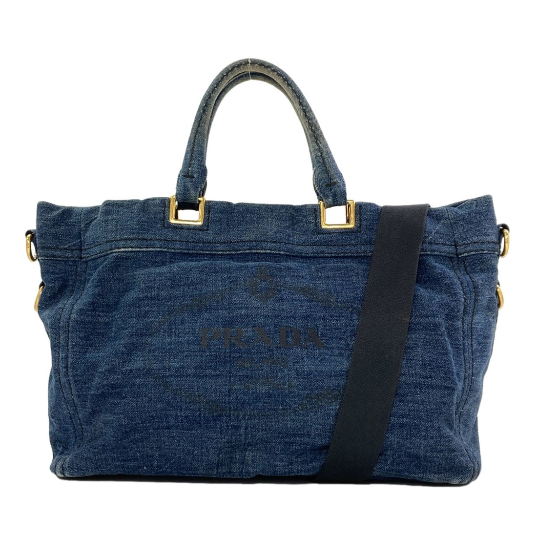 Denim Prada Tote Bag 2Way: Denim Prada Tote Bag 2Way Denim Prada Tote Bag 2Way is a unique, two-way design tote bag made from denim. The bag features a blue exterior with a snap closure and measures 10.2 inches in height and 5.