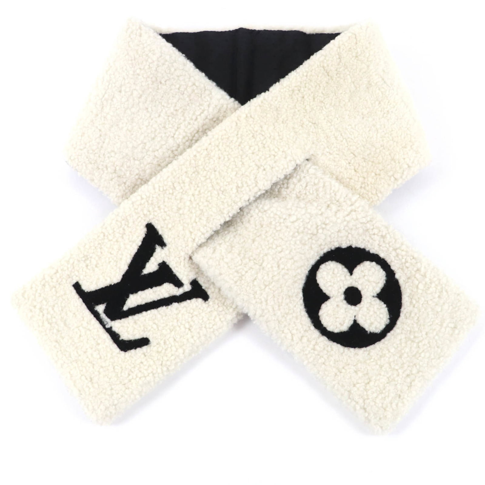 Stole Silk Leather Polyester Louis Vuitton: Stole Silk Leather Polyester Louis Vuitton Stole made from a unique blend of Polyester, Silk, and Leather, this Louis Vuitton piece boasts a striking ivory color and measures 1.02m x 12.5cm, making it