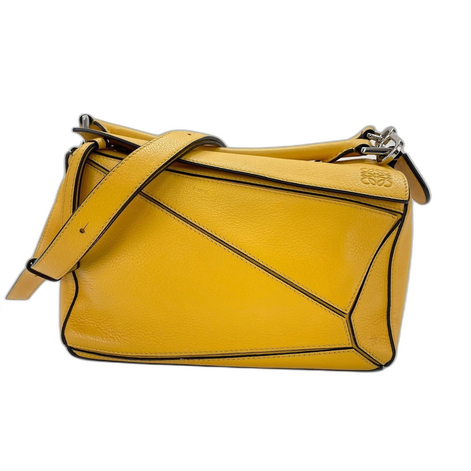 Shoulder Bag: Shoulder Bag Yellow Loewe Puzzle Shoulder Bag. This vibrant yellow shoulder bag features a signature Loewe Puzzle design, with a sturdy 78cm-112cm adjustable strap and a compact 15cm x 24cm x 10cm siz