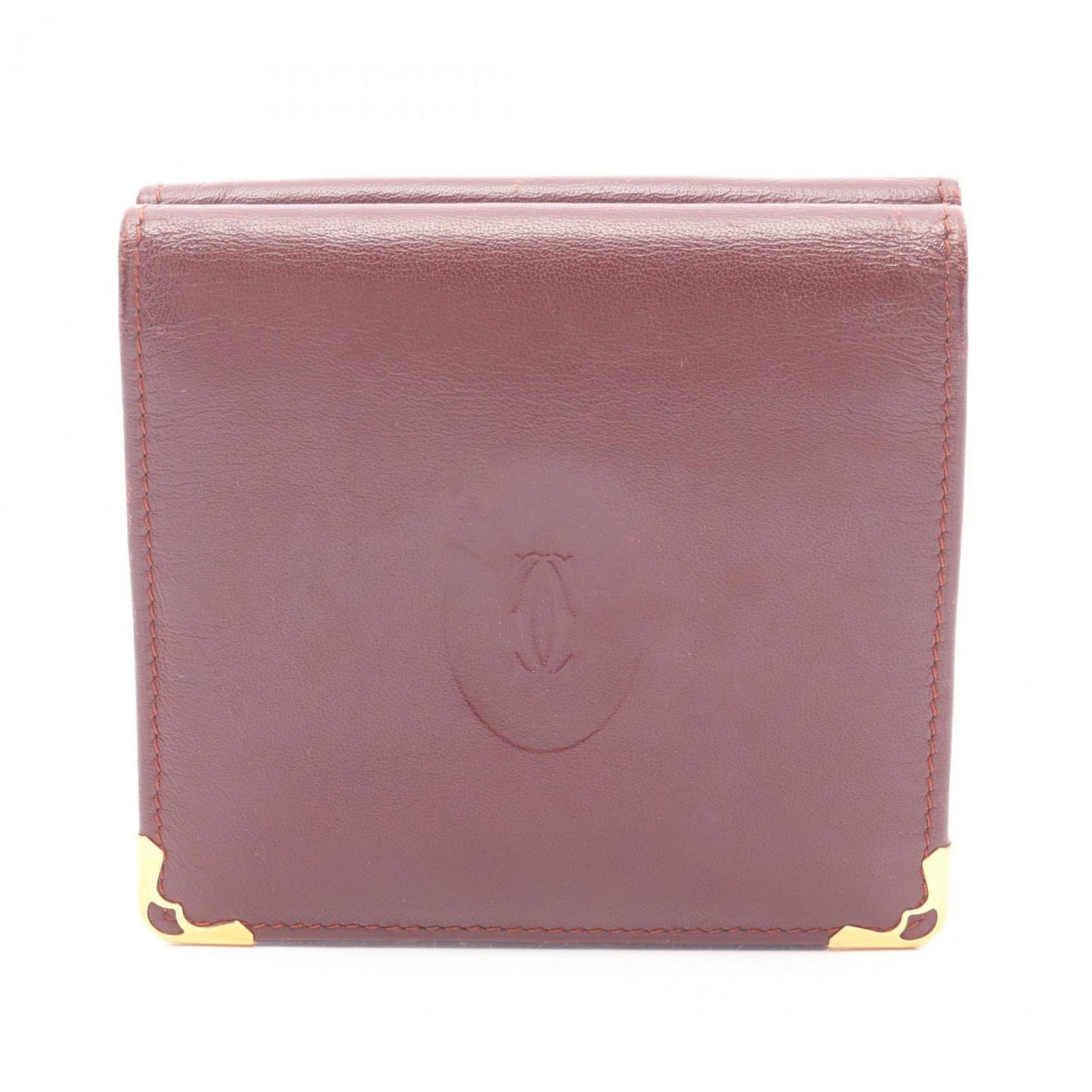Cartier Wallet (Bi-Fold) Leather: Cartier Wallet (Bi-Fold) Leather Bordeaux leather Cartier bi-fold wallet, crafted with attention to detail, features a classic design that exudes timeless elegance. Made from high-quality leather,