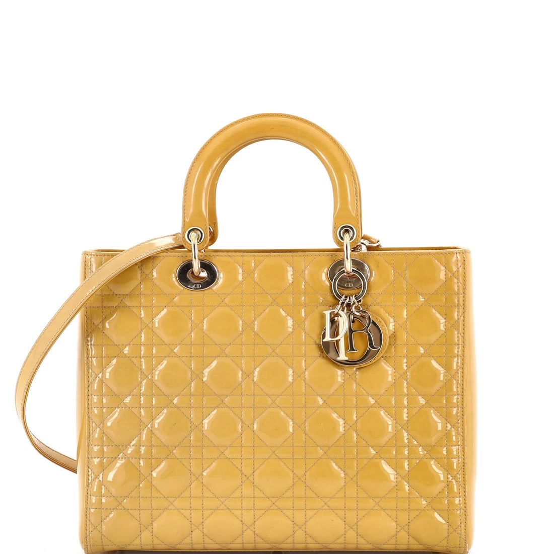 Lady Dior Bag Cannage Medium Patent Quilt Christian: Lady Dior Bag Cannage Medium Patent Quilt Christian The Lady Dior Bag Cannage Medium Patent Quilt Christian features a striking yellow patent leather exterior with a quilted design, adorned with gold