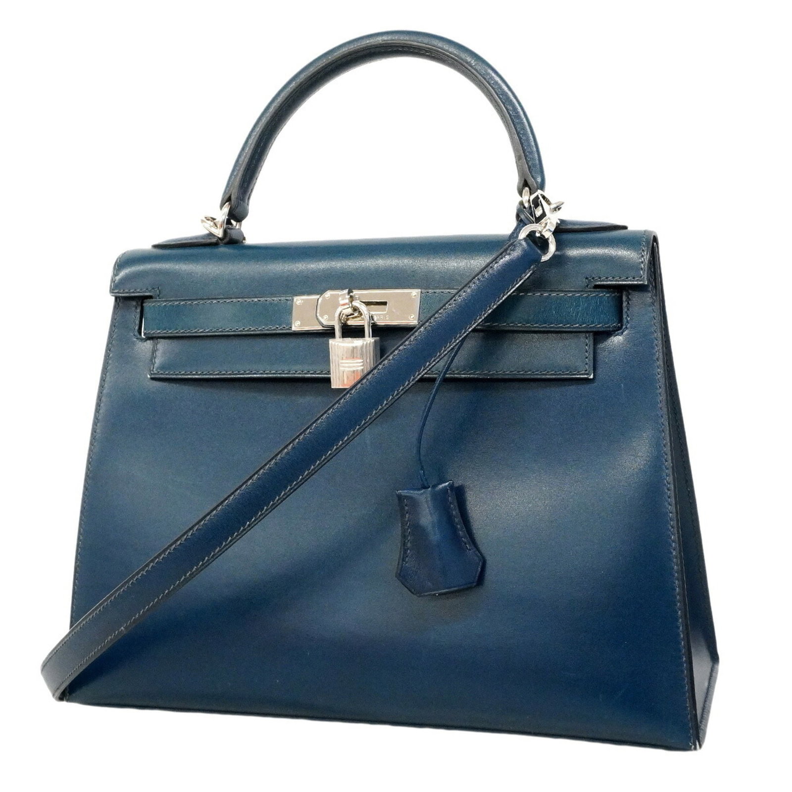 Calf Leather Handbag Box Hermes: Calf Leather Handbag Box Hermes Box calf leather makes this Calf Leather Handbag Box Hermes a sturdy and long-lasting accessory. The Colvert color and silver hardware add a touch of sophistication to 