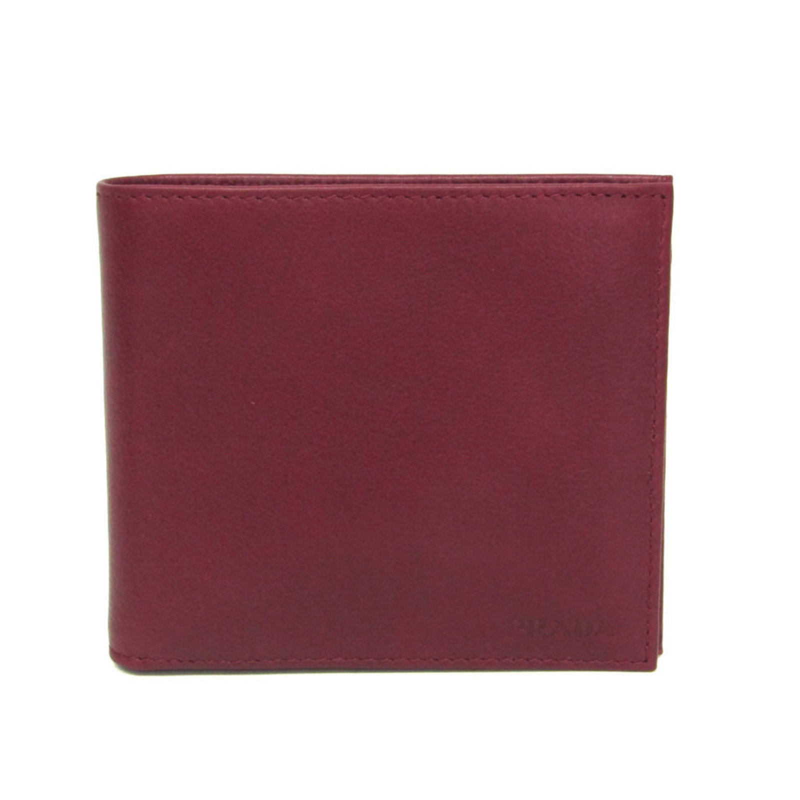 Bi fold leather wallet: Bi fold leather wallet Cherry red leather adds a pop of color to this sleek bi-fold wallet, featuring four card slots, two bill slots, and a coin purse for added convenience. Made from high-quality gr