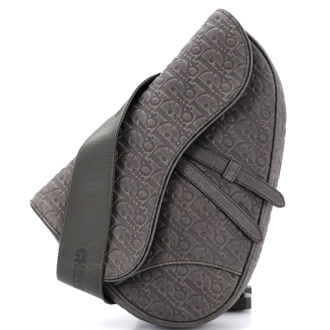 Saddle Crossbody Bag Oblique Suede with Shearling Christian Dior Denim Tears: Saddle Crossbody Bag Oblique Suede with Shearling Christian Dior Denim Tears Saddle Crossbody Bag Oblique Suede with Shearling Denim Tears features a unique blend of textures and colors. The bag's ext