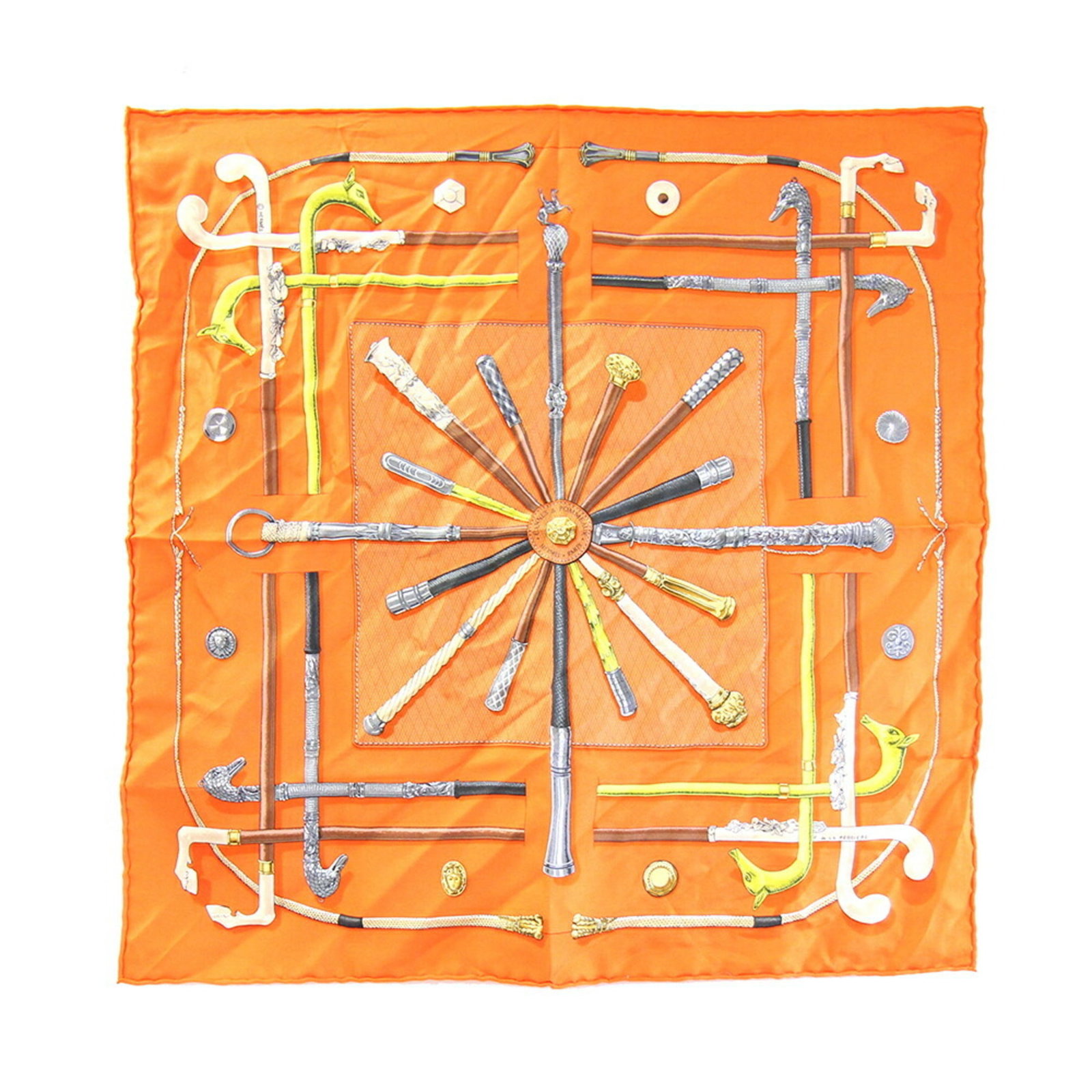 Silk Hermes Scarf 100: Silk Hermes Scarf 100 Silk from France, this 100% silk scarf from Herm?s measures 42cm x 41cm, boasting a vibrant orange hue. A high-quality silk fabric with a classic scarf design, this piece is a ti