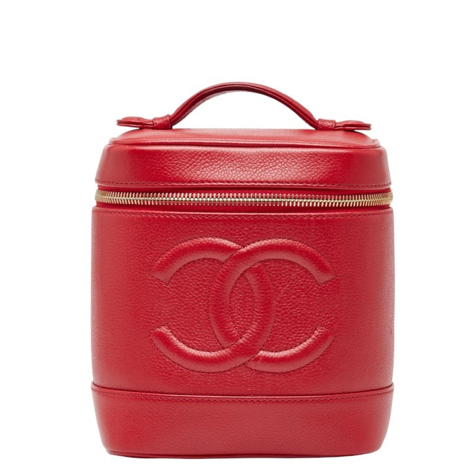 Vanity Bag Chanel Handbag Grained Calfskin: Vanity Bag Chanel Handbag Grained Calfskin Grained Calfskin Red Chanel Handbag with Zipper Closure. This vanity bag features a striking red color and a structured design made from high-quality grained