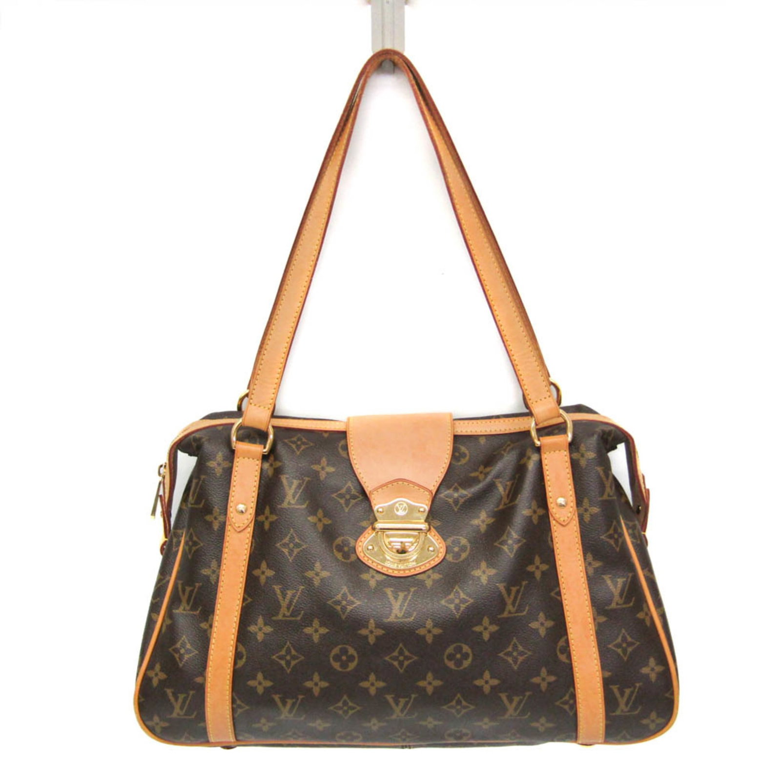 Shoulder Bag Monogram Louis Vuitton: Shoulder Bag Monogram Louis Vuitton Monogrammed with precision, this Louis Vuitton Streza PM shoulder bag boasts a striking Monogram pattern and a sleek, structured design. With a spacious open pocket