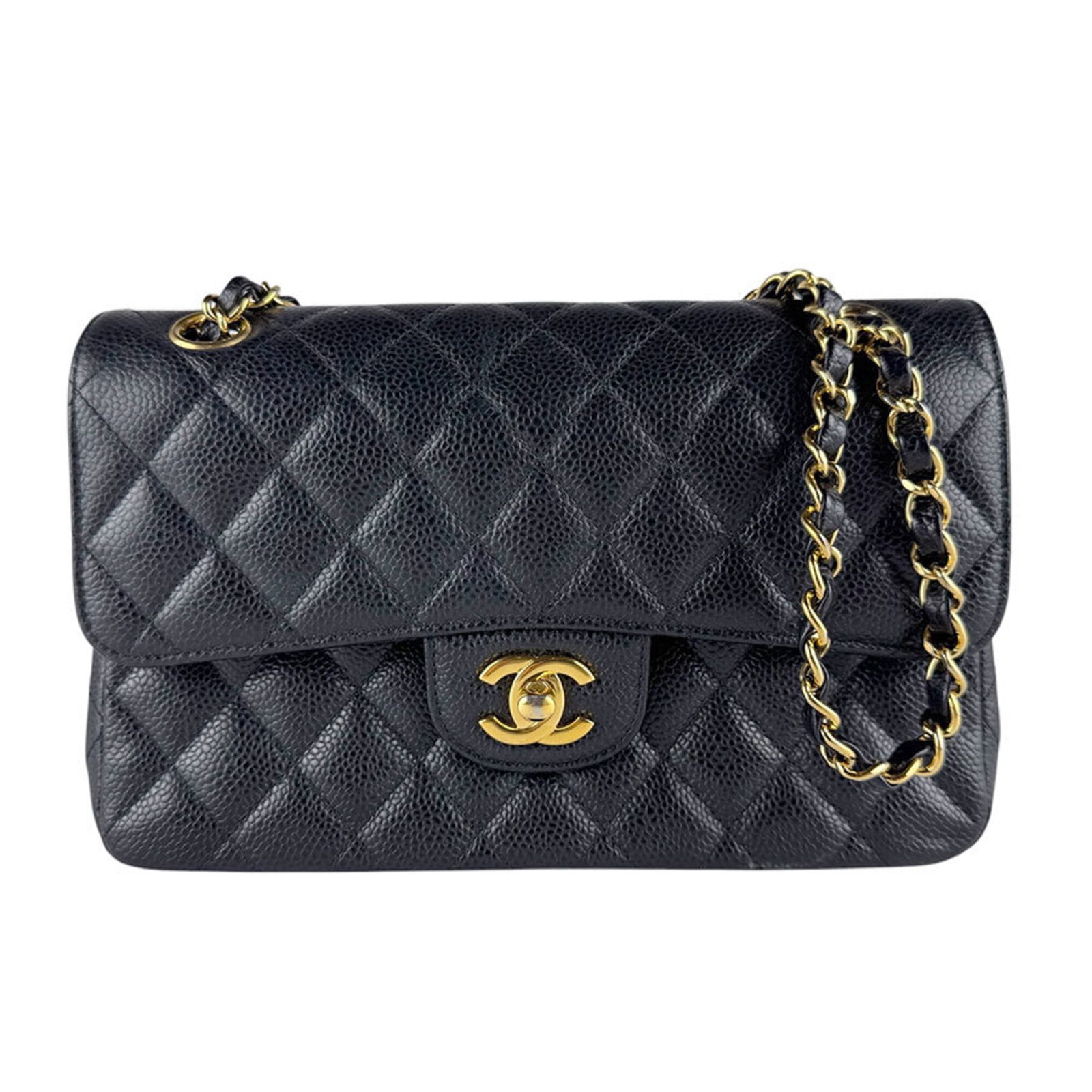 Calfskin Grained Chanel Bag Shoulder: Calfskin Grained Chanel Bag Shoulder Grained calfskin gives this black Chanel shoulder bag a luxurious feel, while its compact size makes it easy to carry. Measuring 14cm x 22cm x 6cm, it's a stylish