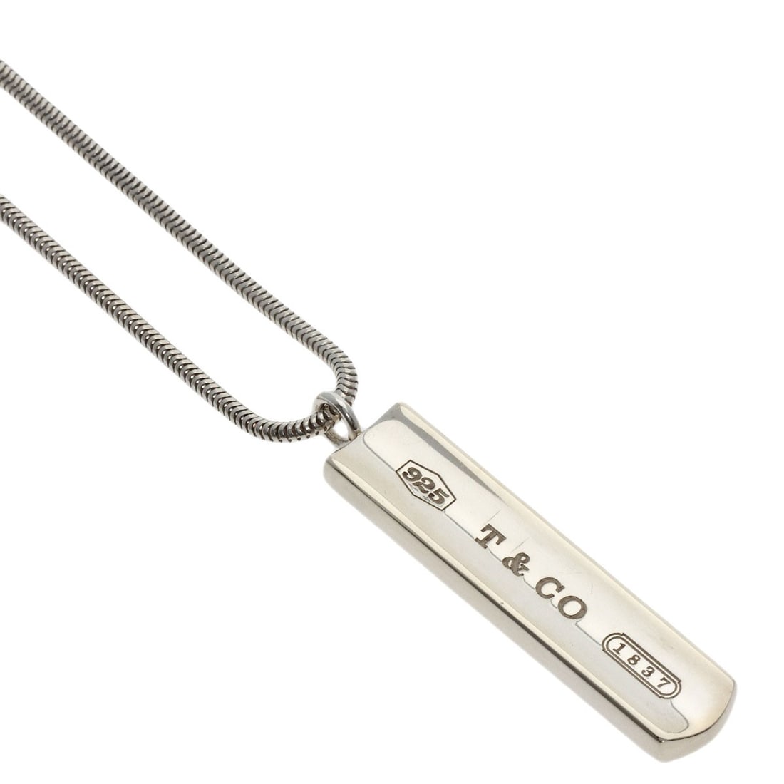 Tiffany & Co Silver Bar Necklace 1837: Tiffany & Co Silver Bar Necklace 1837 Tiffany & Co's 1837 Silver Bar Necklace is a striking piece of silver jewelry, bearing the iconic brand's signature. The necklace's sleek design and substantial w