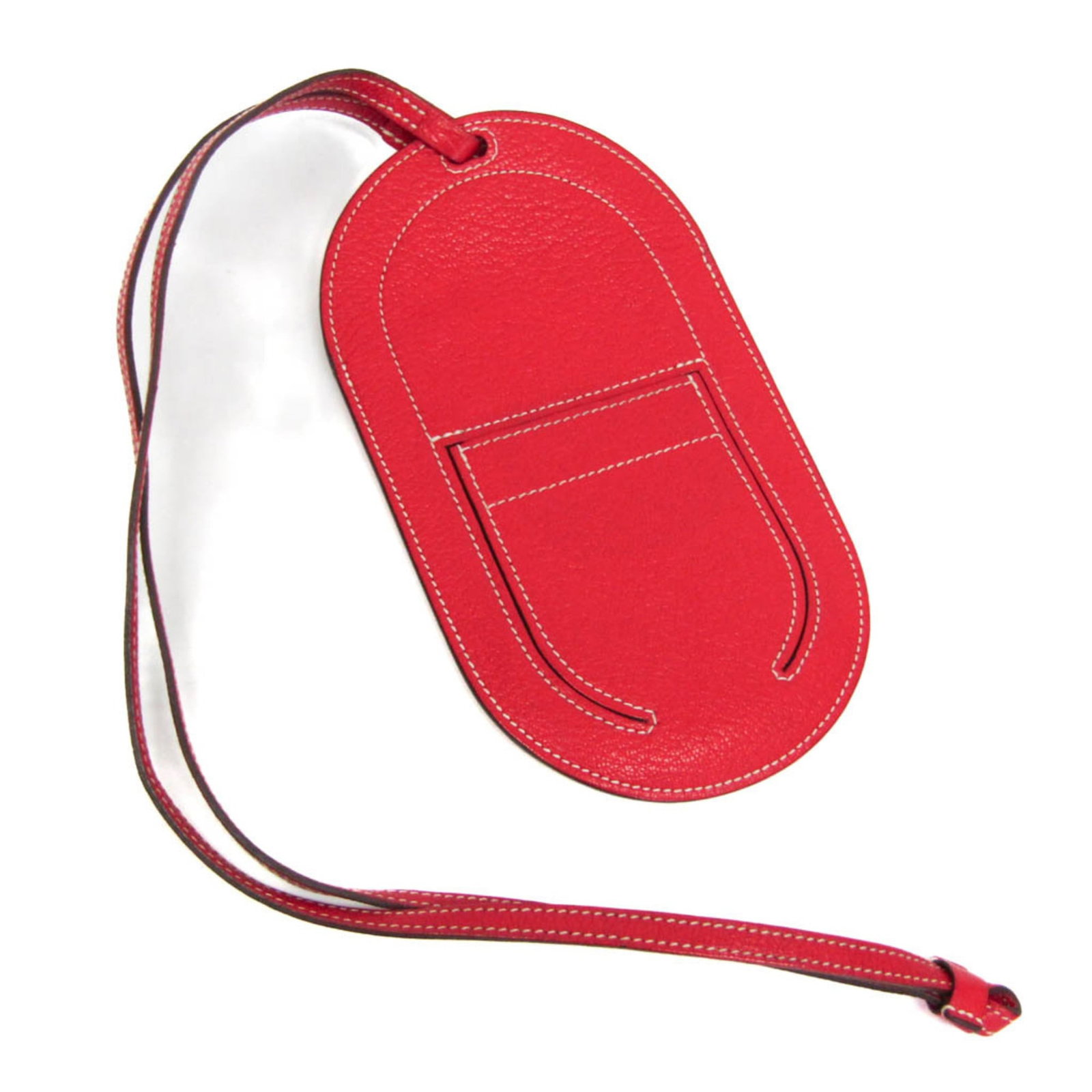 Leather pouch chevre Hermes: Leather pouch chevre Hermes Chevre leather pouch from Hermes, featuring a vibrant red color and adjustable strap for a secure fit. This compact case measures 17.5cm x 9.5cm and weighs just 40g,