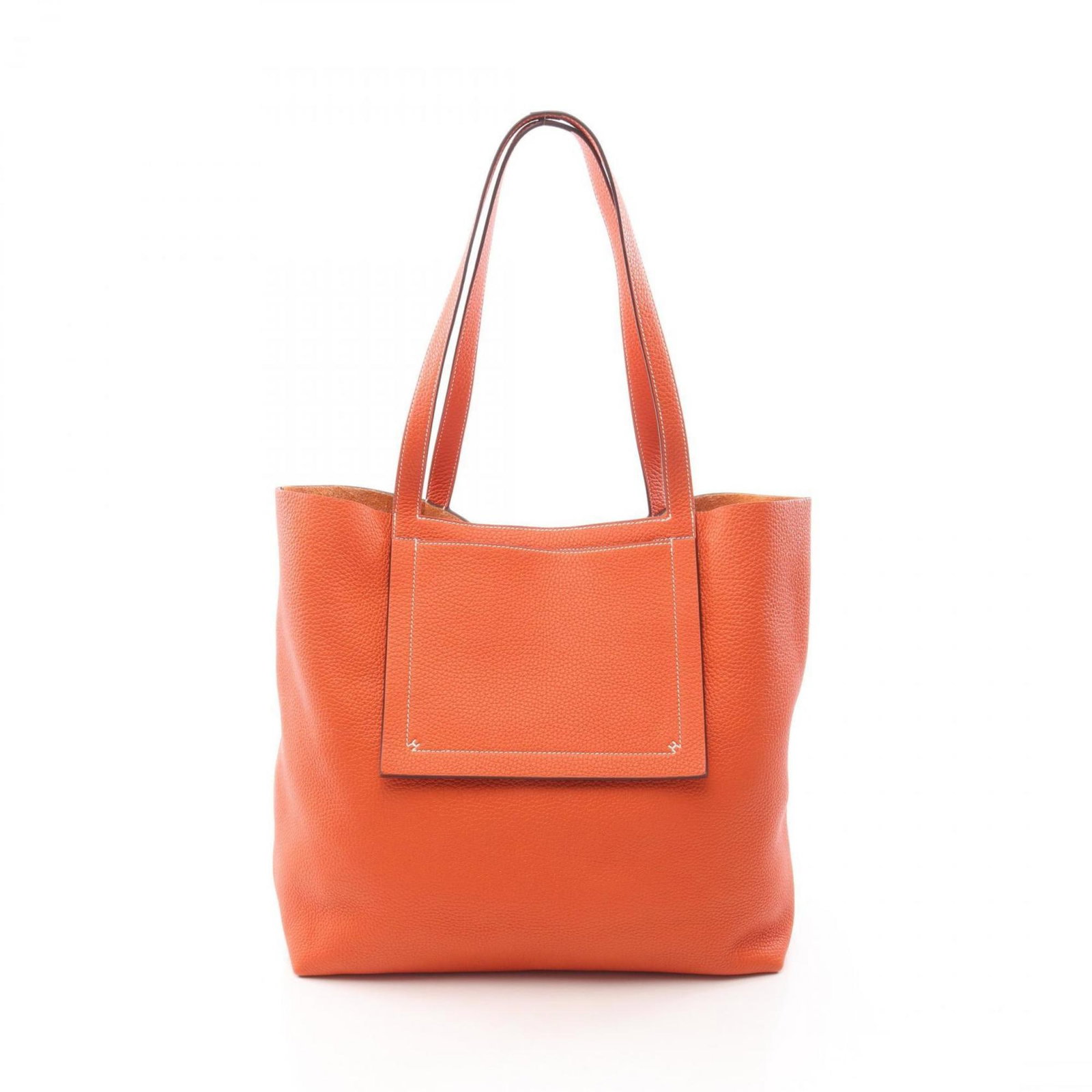 Tote bag clemence taurillon hermes leather: Tote bag clemence taurillon hermes leather Taurillon clemence leather tote bag from Hermes, featuring a vibrant orange color and a unique design. This stylish tote measures 34cm x 36cm x 14cm, making