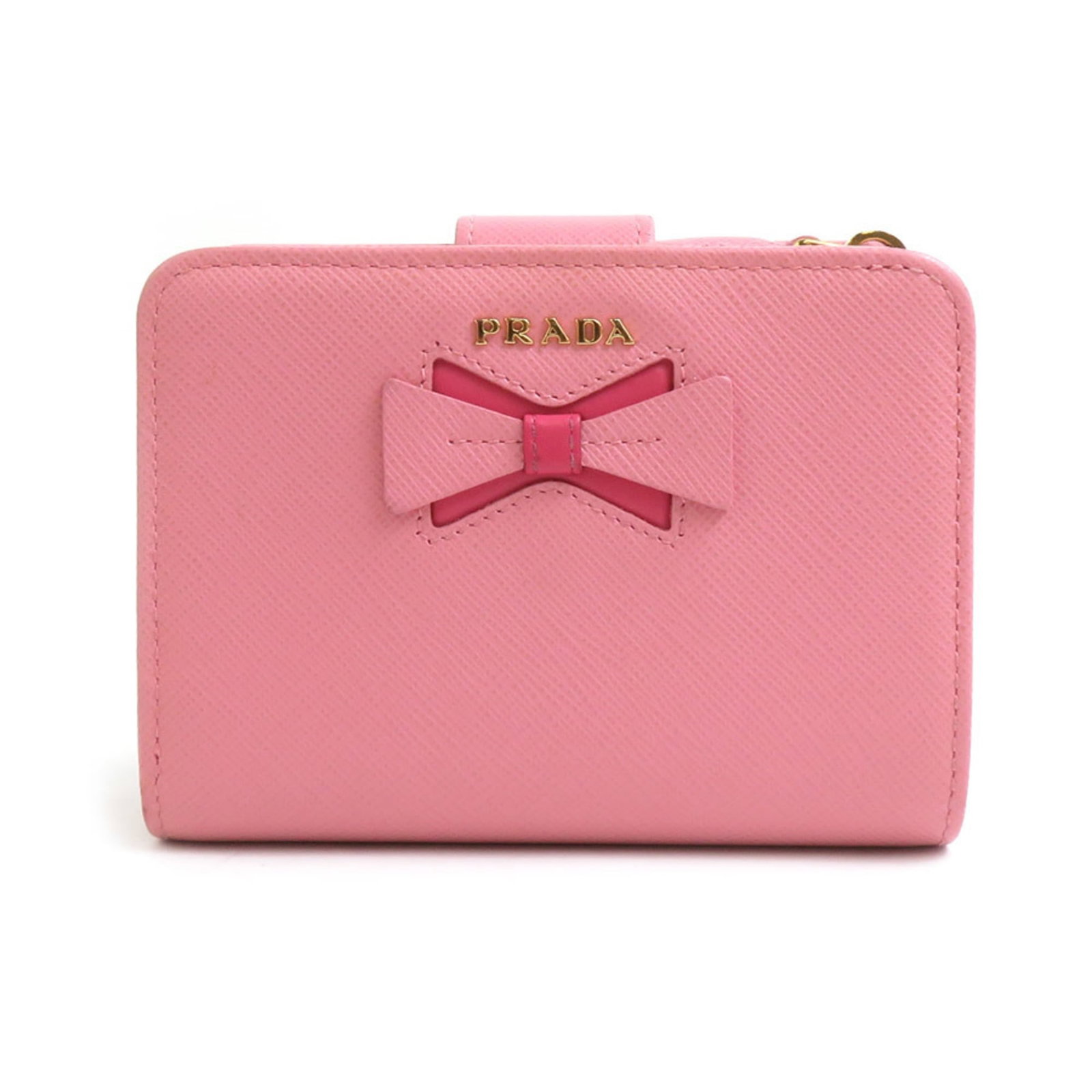 Bi fold leather wallet: Bi fold leather wallet Prada bi-fold leather wallet in pink, measuring 9cm x 12cm x 2.5cm, comes with a box and shop card. The wallet features high-quality leather construction and a classic bi-fold