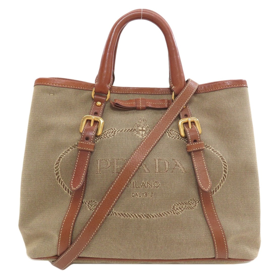2Way Canvas Handbag Fiocco Prada: 2Way Canvas Handbag Fiocco Prada Item Specifics: Brand: PRADA Style: Handbag Color: Brown Type: Handbag Exterior Color: Brown Accessories: Detachable Strap Exterior Material: Canvas Product