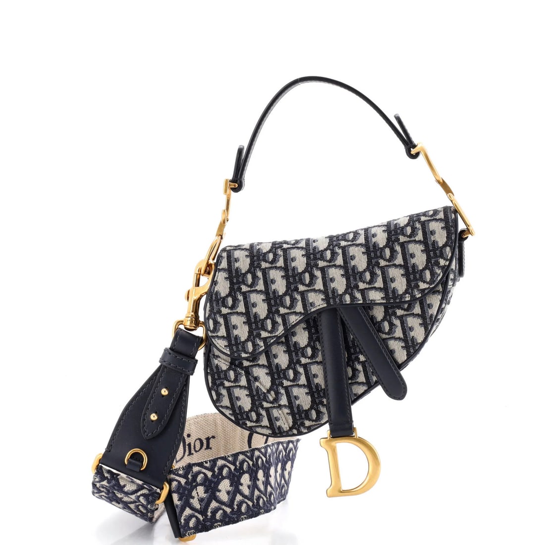 Christian Dior Saddle Handbag with Strap Oblique Canvas Mini: Christian Dior Saddle Handbag with Strap Oblique Canvas Mini Blue Canvas Saddle Handbag with Strap Oblique Miniature in Great Condition. This Christian Dior Saddle Handbag with Strap Oblique Canvas