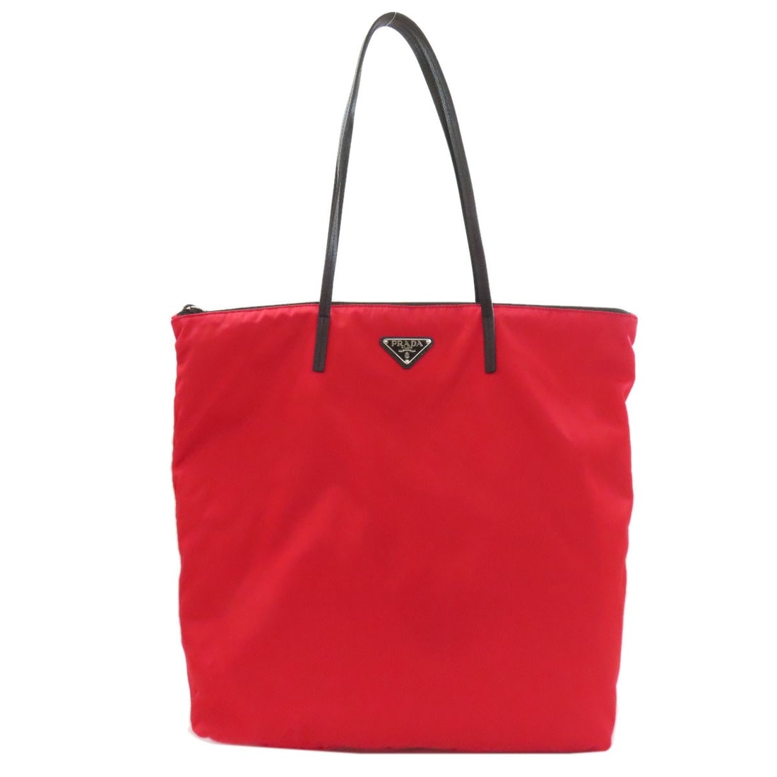 Prada Logo Hardware Tote Bag Nylon: Prada Logo Hardware Tote Bag Nylon Red Prada Logo Hardware Tote Bag made from Nylon. The bag features the iconic Prada logo hardware, a distinctive red exterior color, and a classic tote bag style.