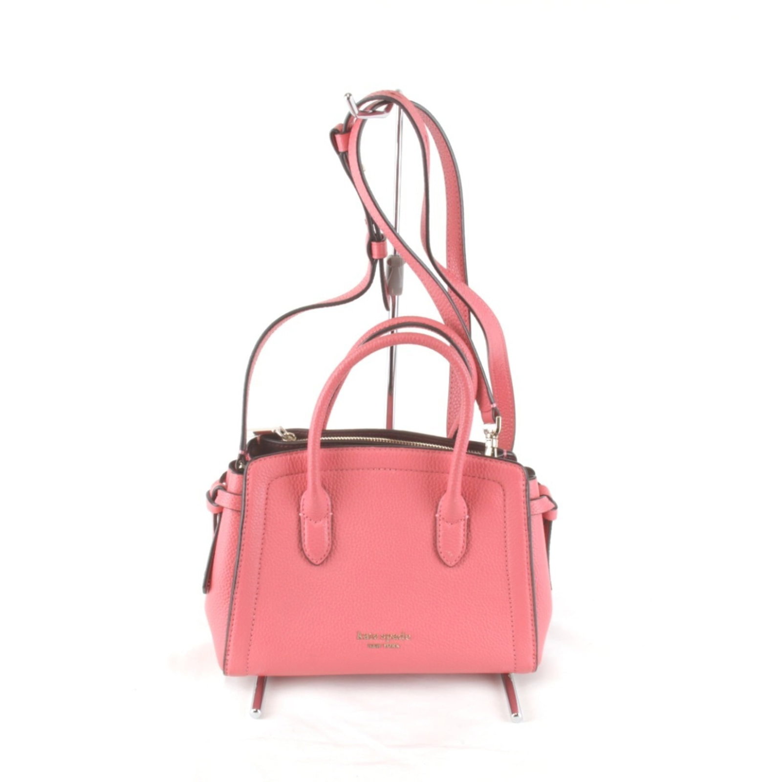 Kate Spade Leather Handbag: Kate Spade Leather Handbag Kate Spade Leather Handbag in Pink. This 16cm x 23cm x 9cm leather handbag features a pink color and comes with a shoulder strap, making it a stylish and practical