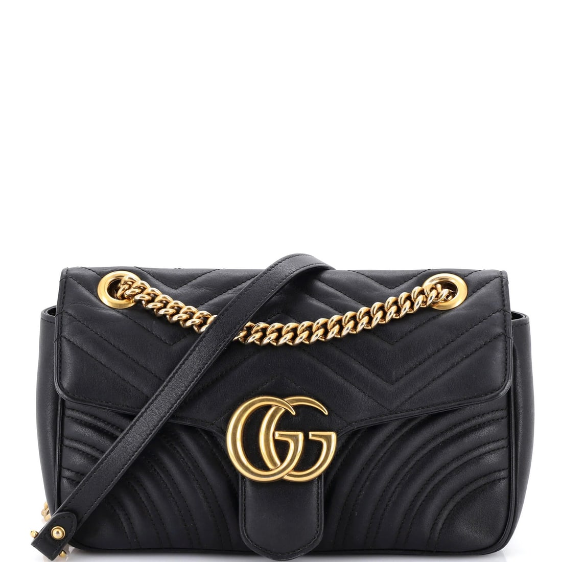 Marmont Matelasse Medium Leather Bag Flap Gucci GG: Marmont Matelasse Medium Leather Bag Flap Gucci GG Black Marmont Matelasse Medium Leather GG Gucci Flap Bag with neutral microfiber interior and aged gold hardware. This medium-sized shoulder bag feat