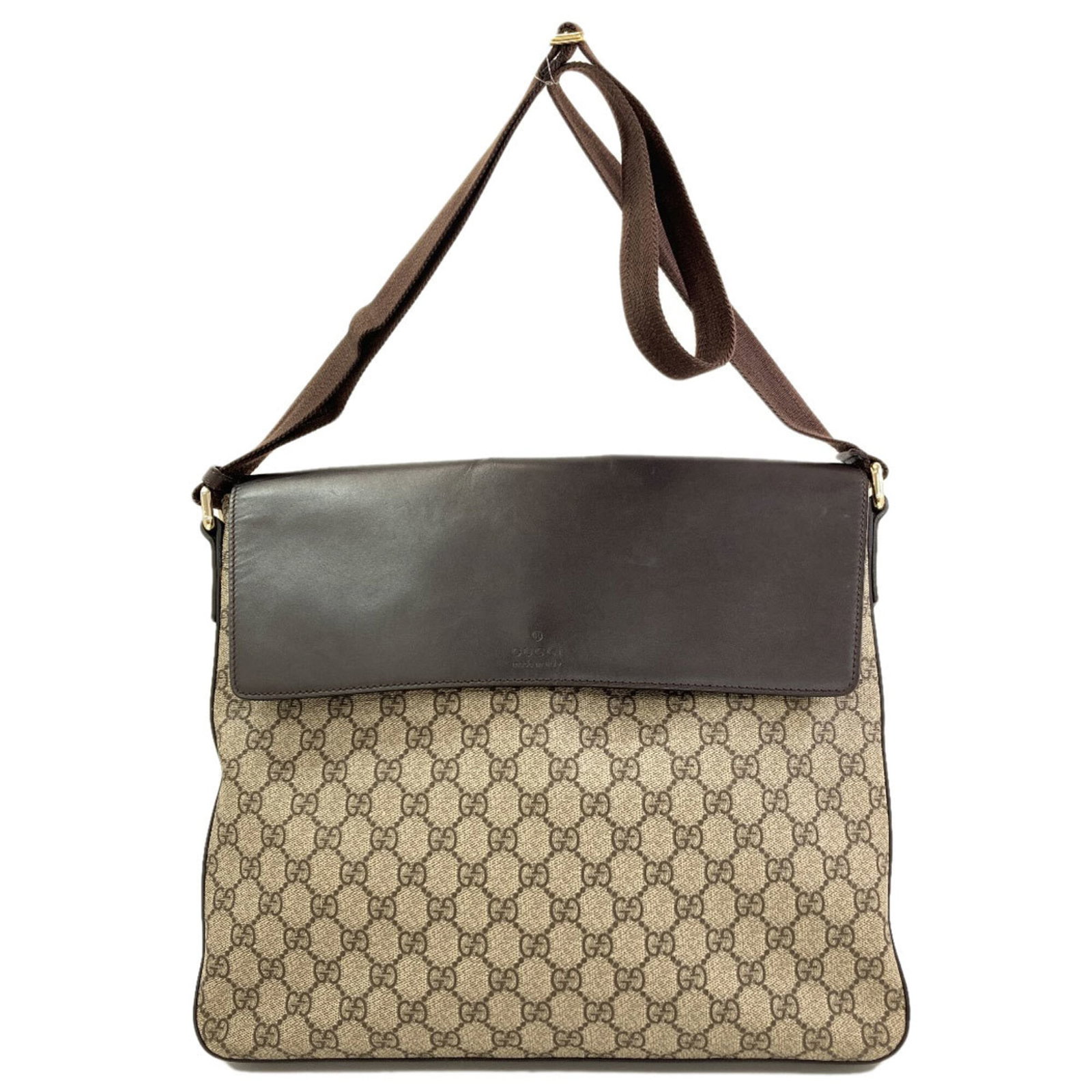 Shoulder Bag Pvc Gucci: Shoulder Bag Pvc Gucci This Gucci shoulder bag is made from PVC material and features a brown color. It measures 29cm x 35.5cm x 3cm and has a sleek, compact design. The bag bears a signature, a notab