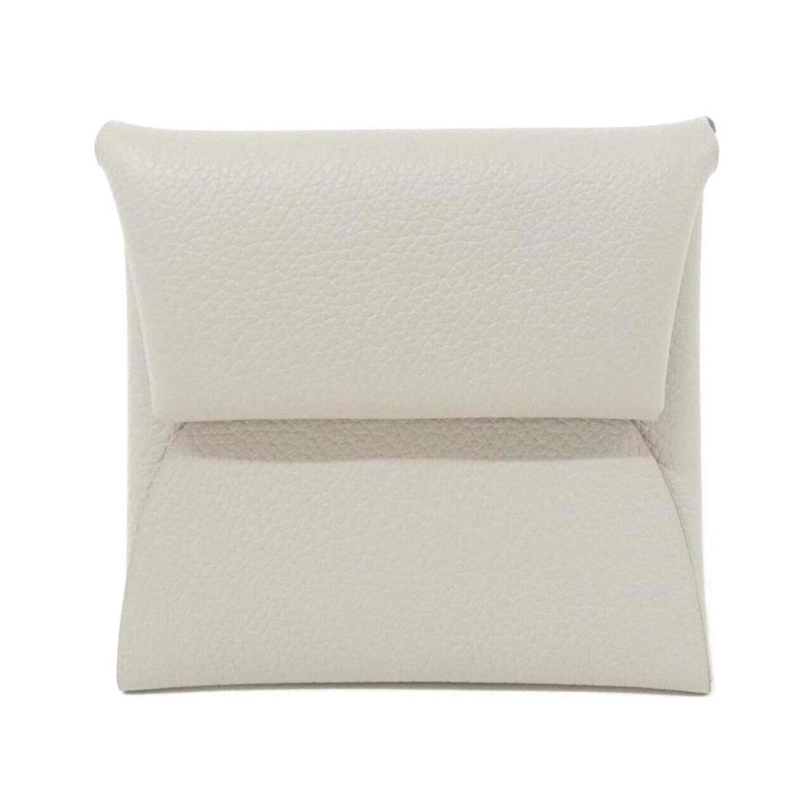 Coin Purse Coin Case: Coin Purse Coin Case The Hermes MPN 074613CK Coin Purse Coin Case is a compact, beige-colored accessory with a size of 8cm x 9cm x 1cm. Its sleek design and dimensions make it a practical and stylish 