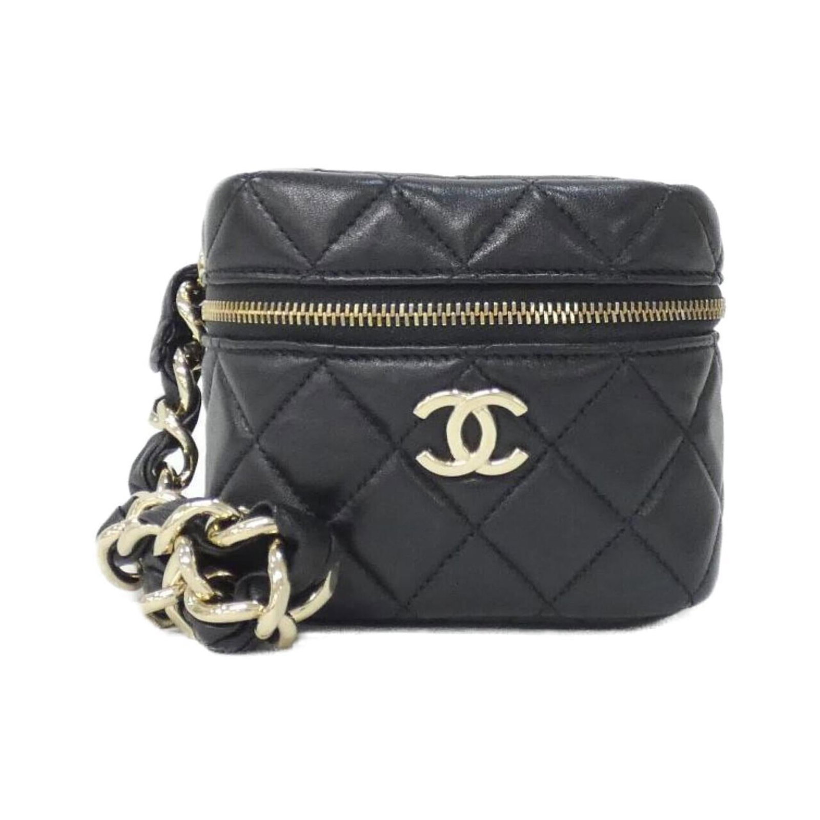 Chanel Leather Pouch Handbag: Chanel Leather Pouch Handbag Chanel's iconic leather pouch handbag boasts a sleek, all-black lambskin design, measuring 10cm x 10cm x 11cm. This compact, stylish accessory is crafted from high-quality
