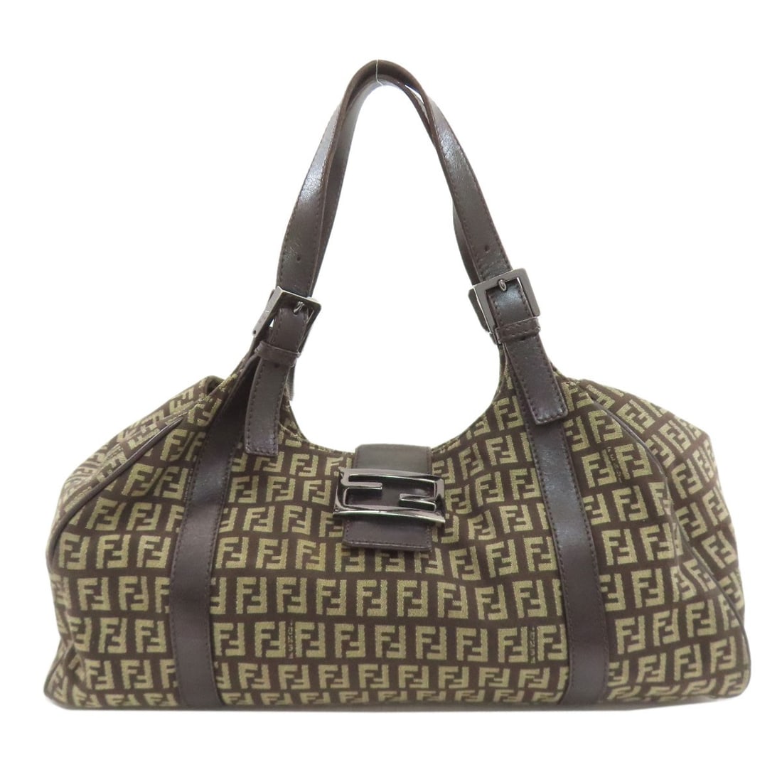 Canvas tote bag by Fendi: Canvas tote bag by Fendi Brown canvas tote bag by Fendi. Made from high-quality canvas, this tote bag features a classic design that exudes timeless elegance. With its understated brown exterior,