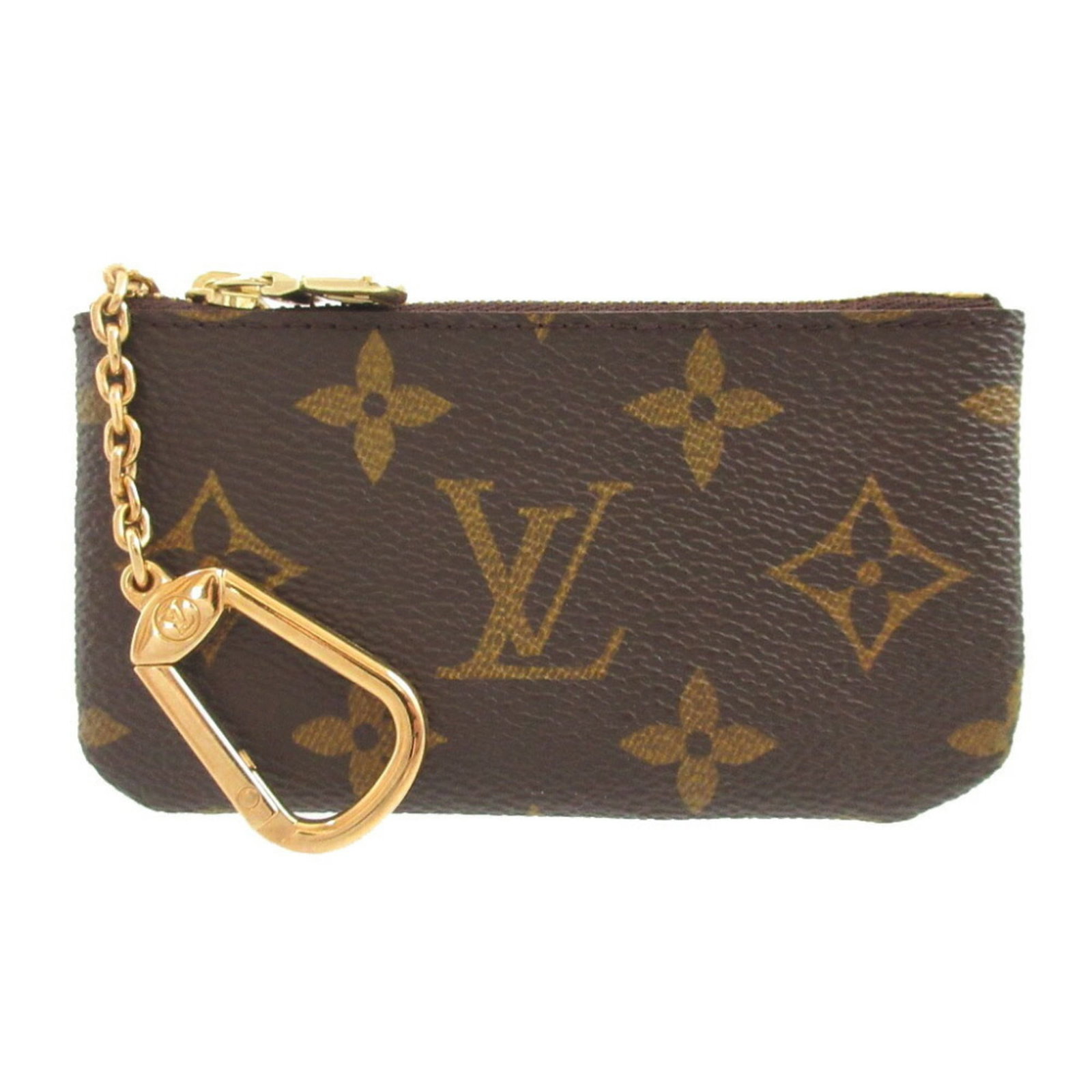 Coin purse Monogram Louis Vuitton: Coin purse Monogram Louis Vuitton Monogram Louis Vuitton coin purse in brown, accompanied by a box, is a stylish accessory. The item features the iconic monogram pattern, a notable design element of